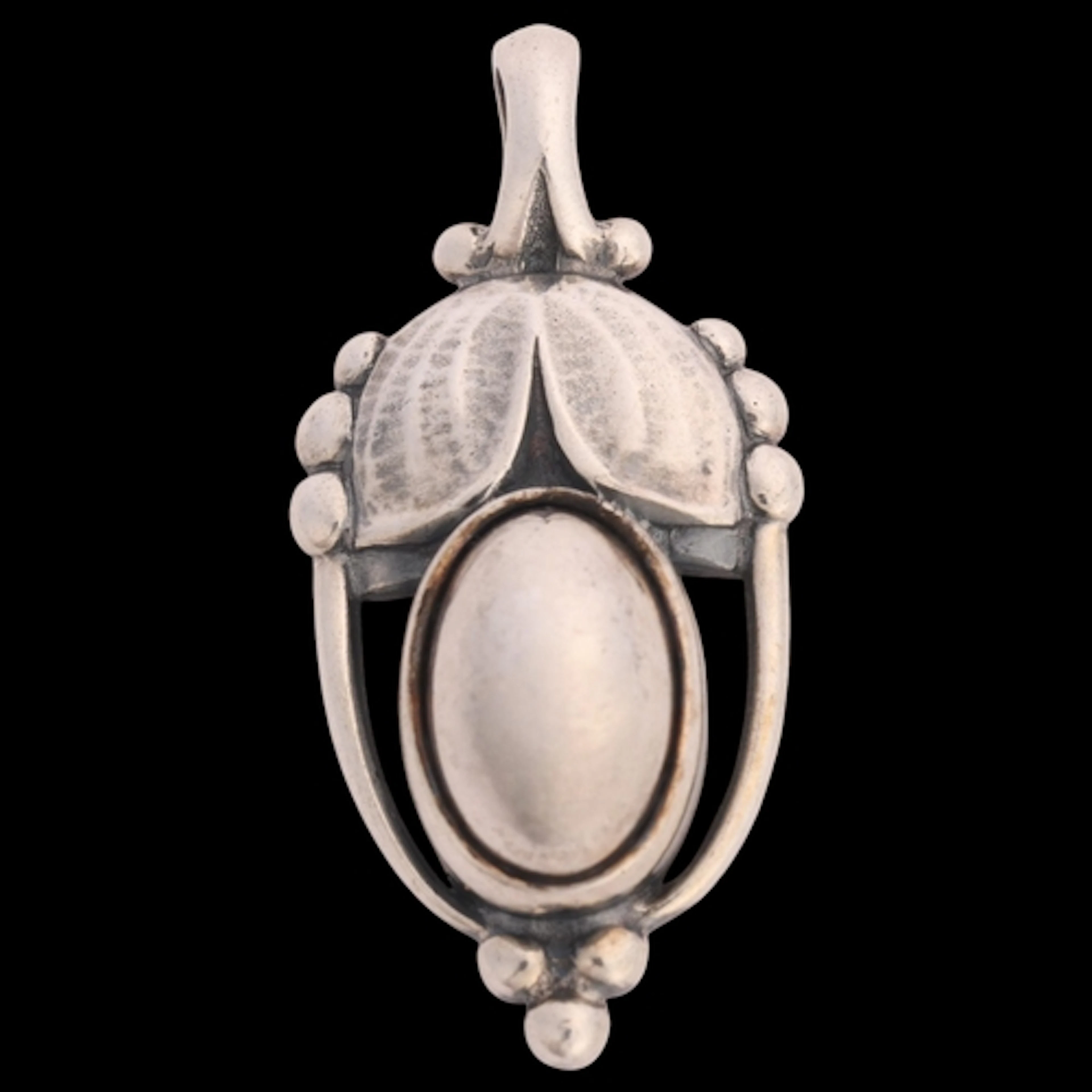 GEORG JENSEN - a Danish modernist sterling silver Pendant Of...