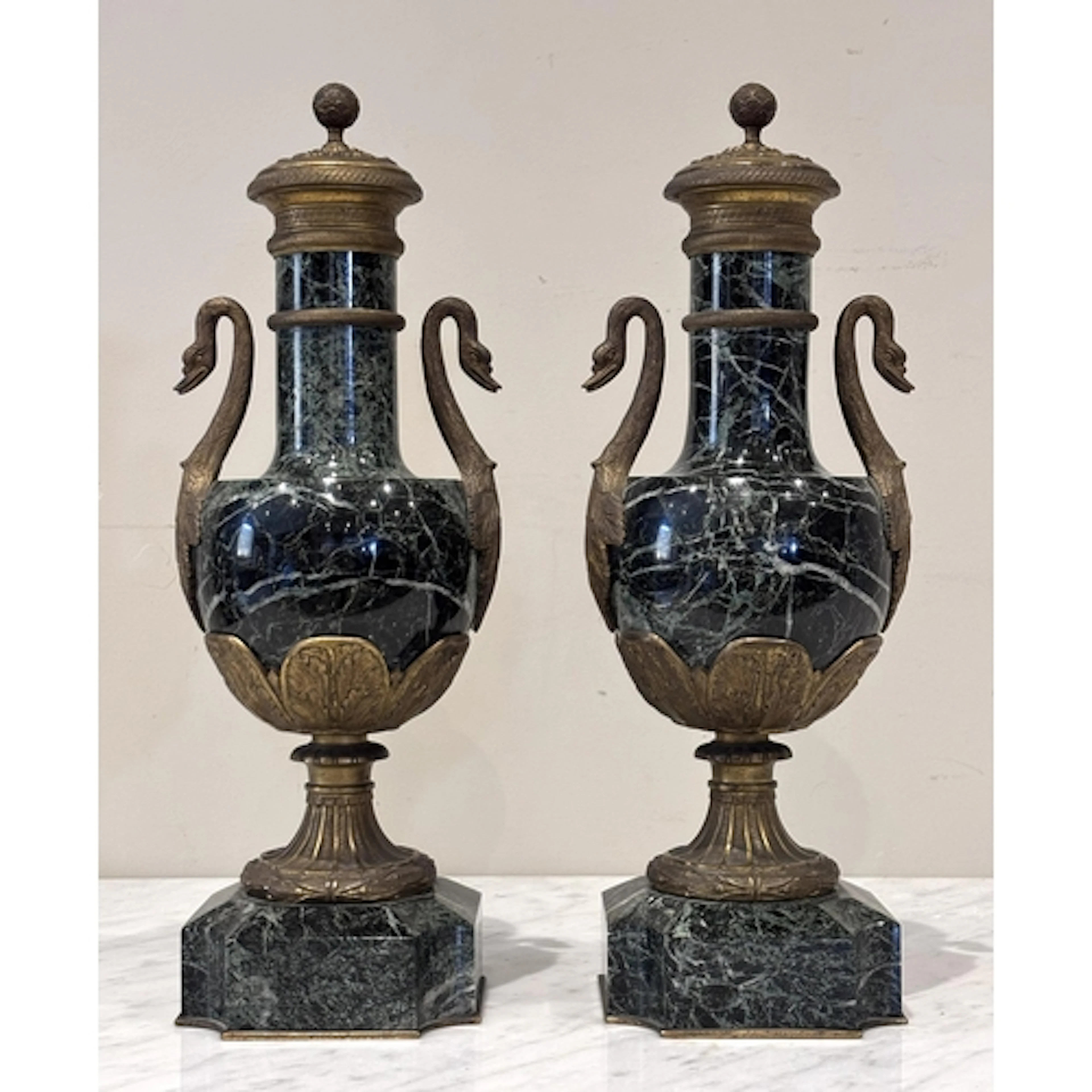 A pair of French Louis XVI style green marble and ormolu mou...