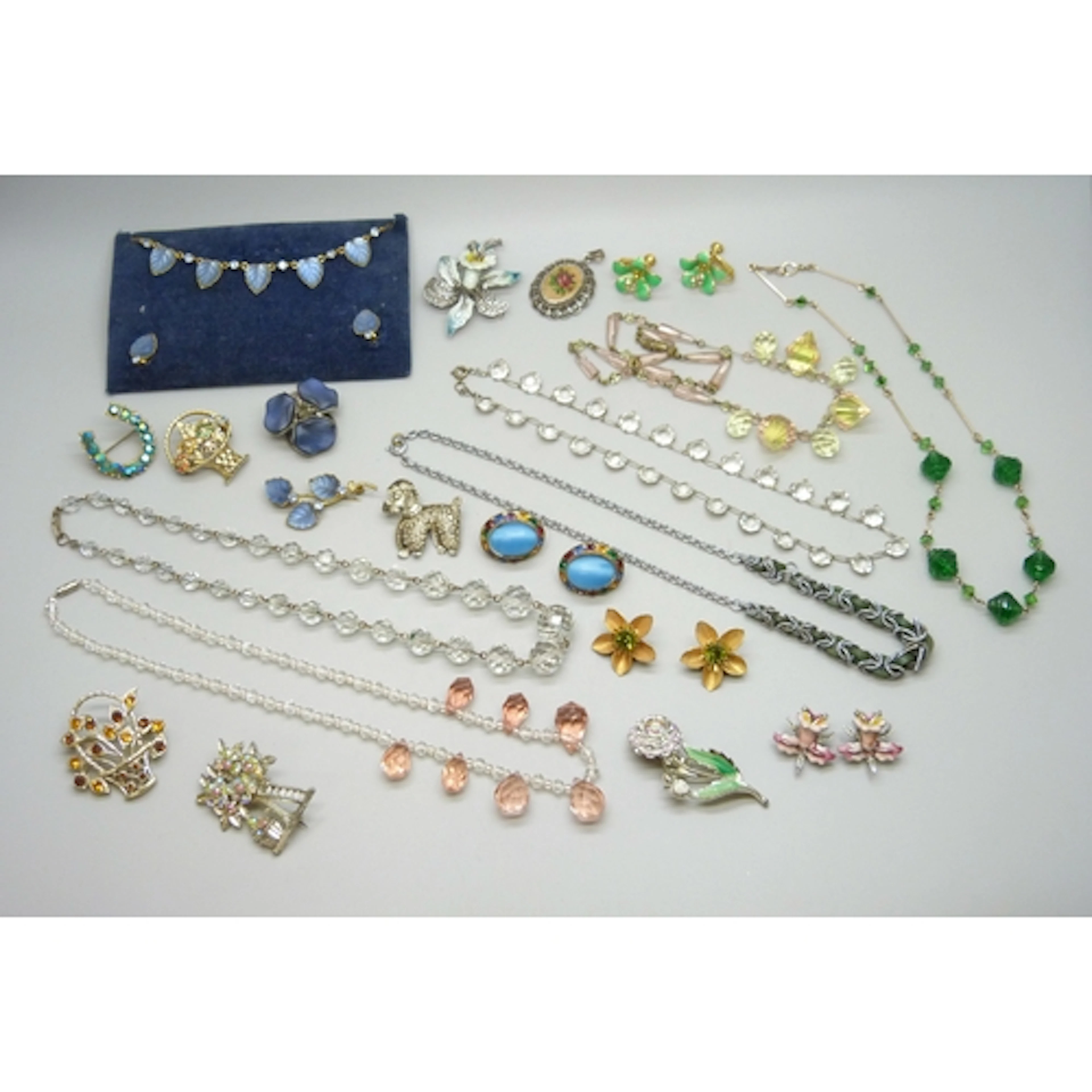 A collection of Art Deco glass bead necklaces including a ri...