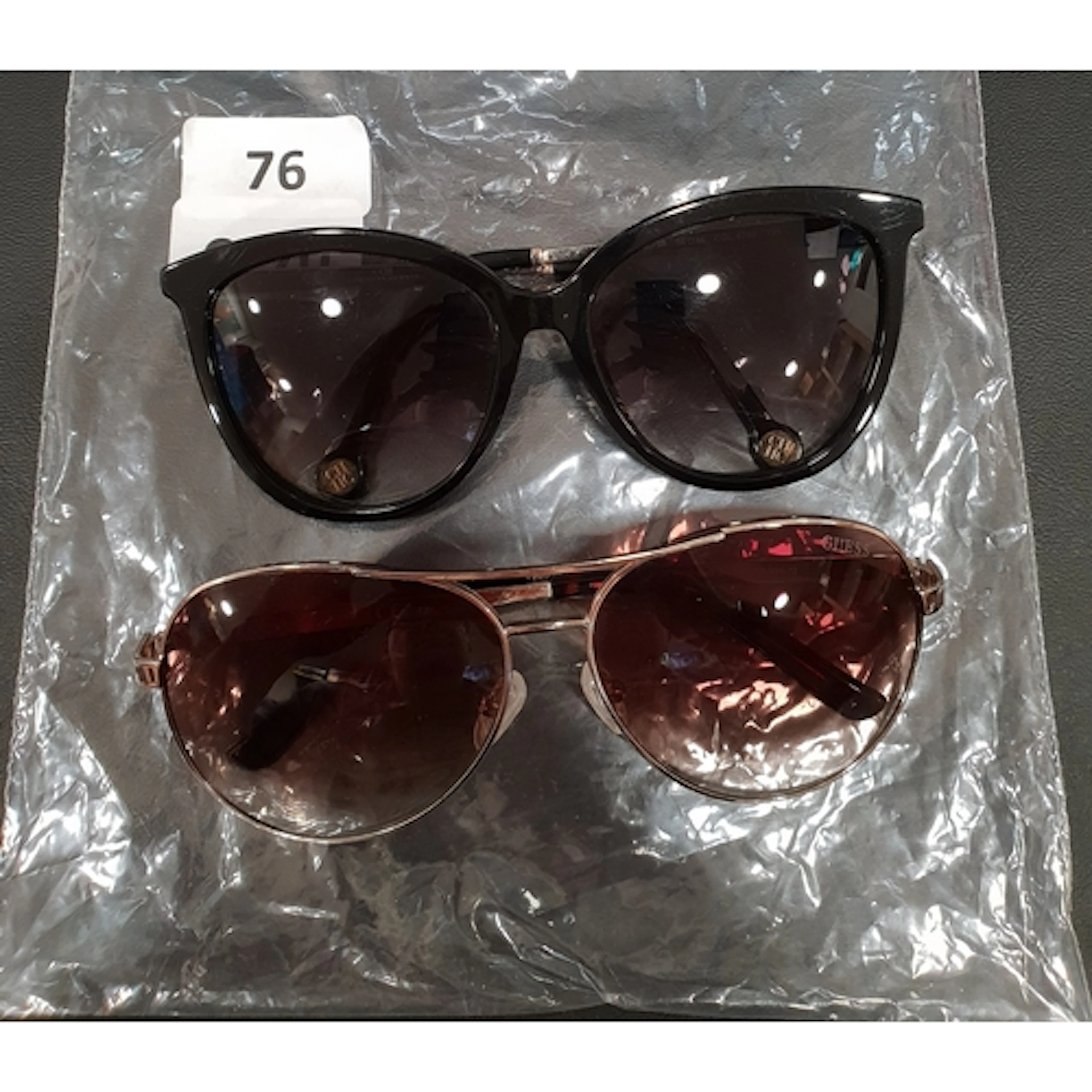 TWO PAIRS OF SUNGLASSES comprising Carolina Herrera model SH...