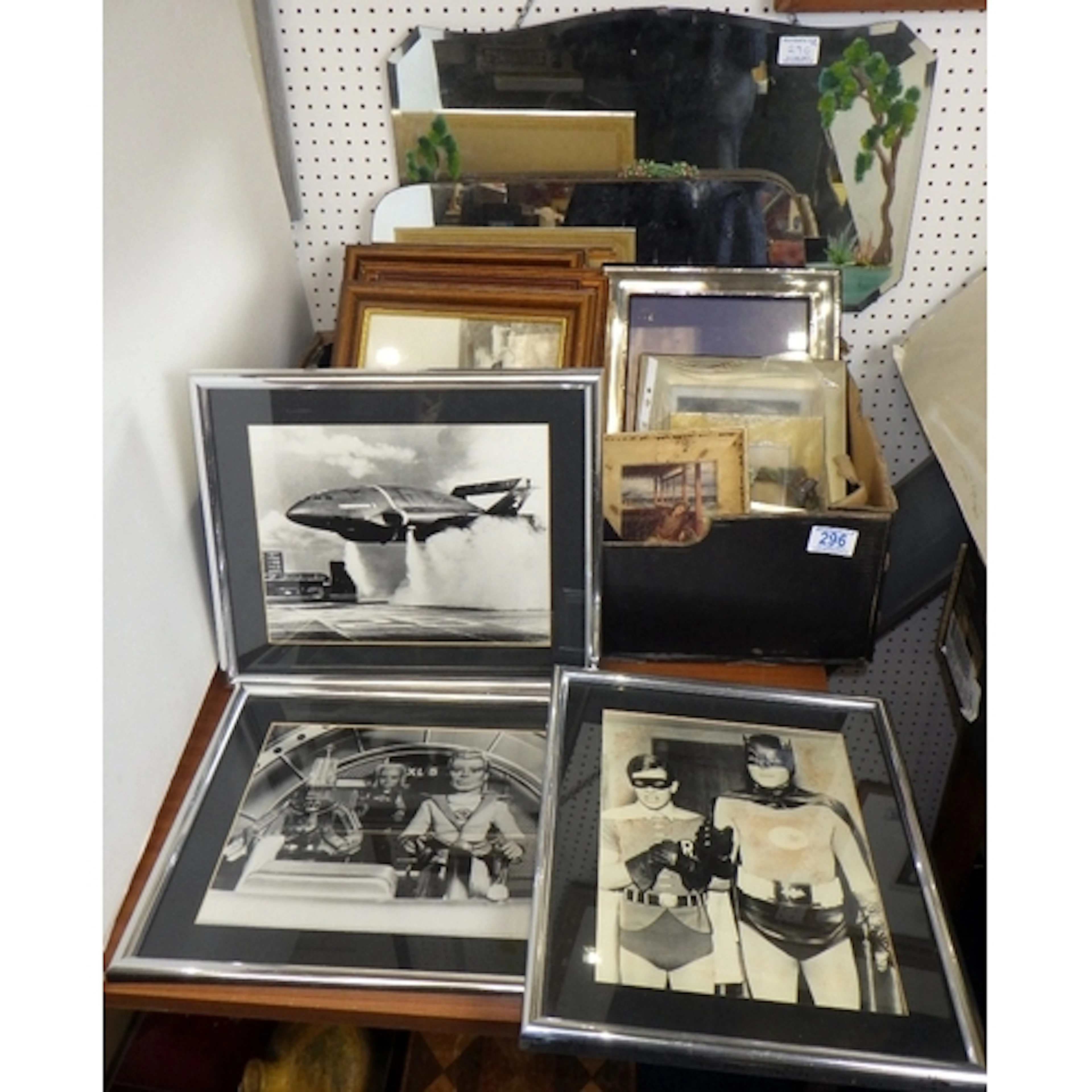 A group of various pictures and prints together with Batman,...