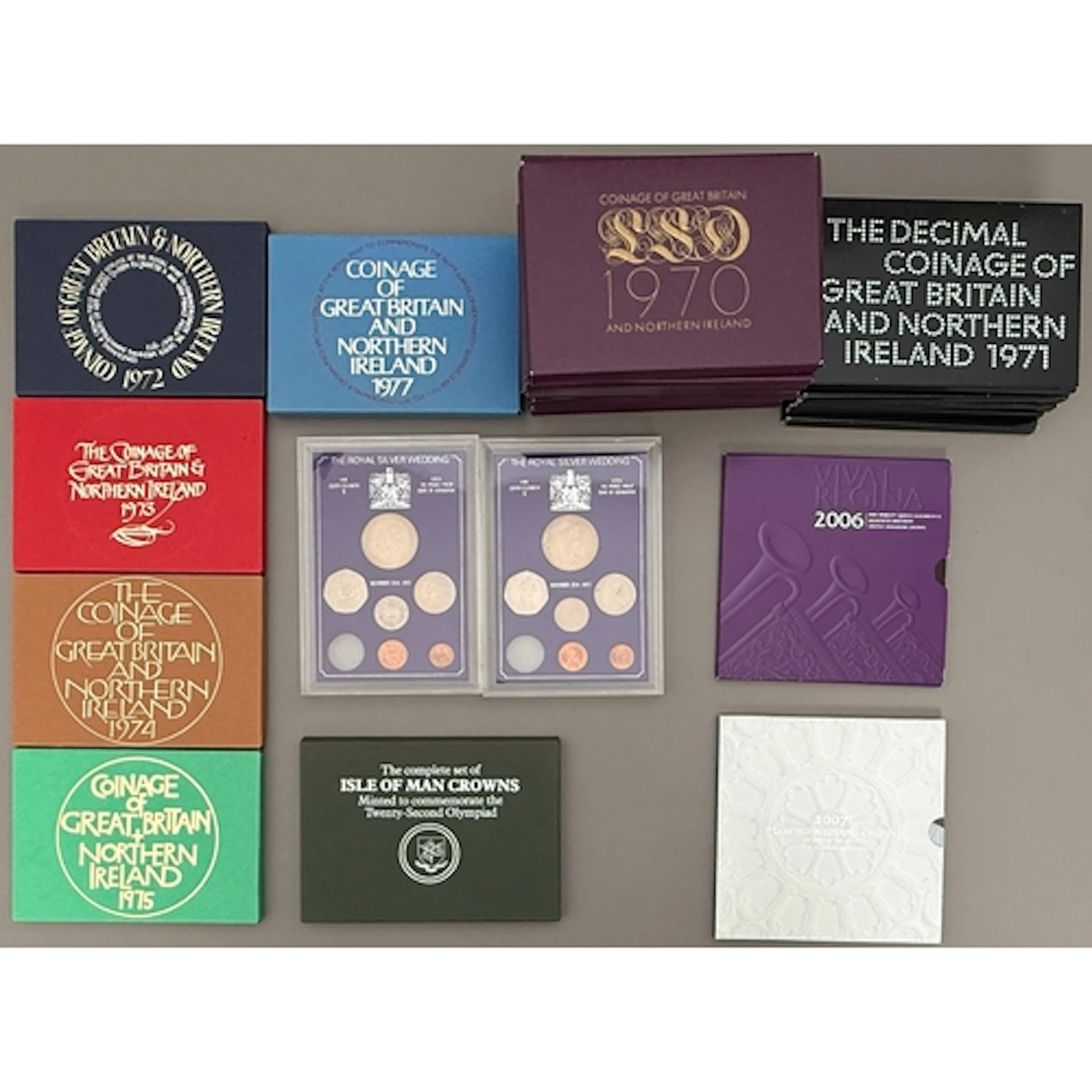 Twenty-two Royal Mint Coinage of Great Britain proof sets - ...