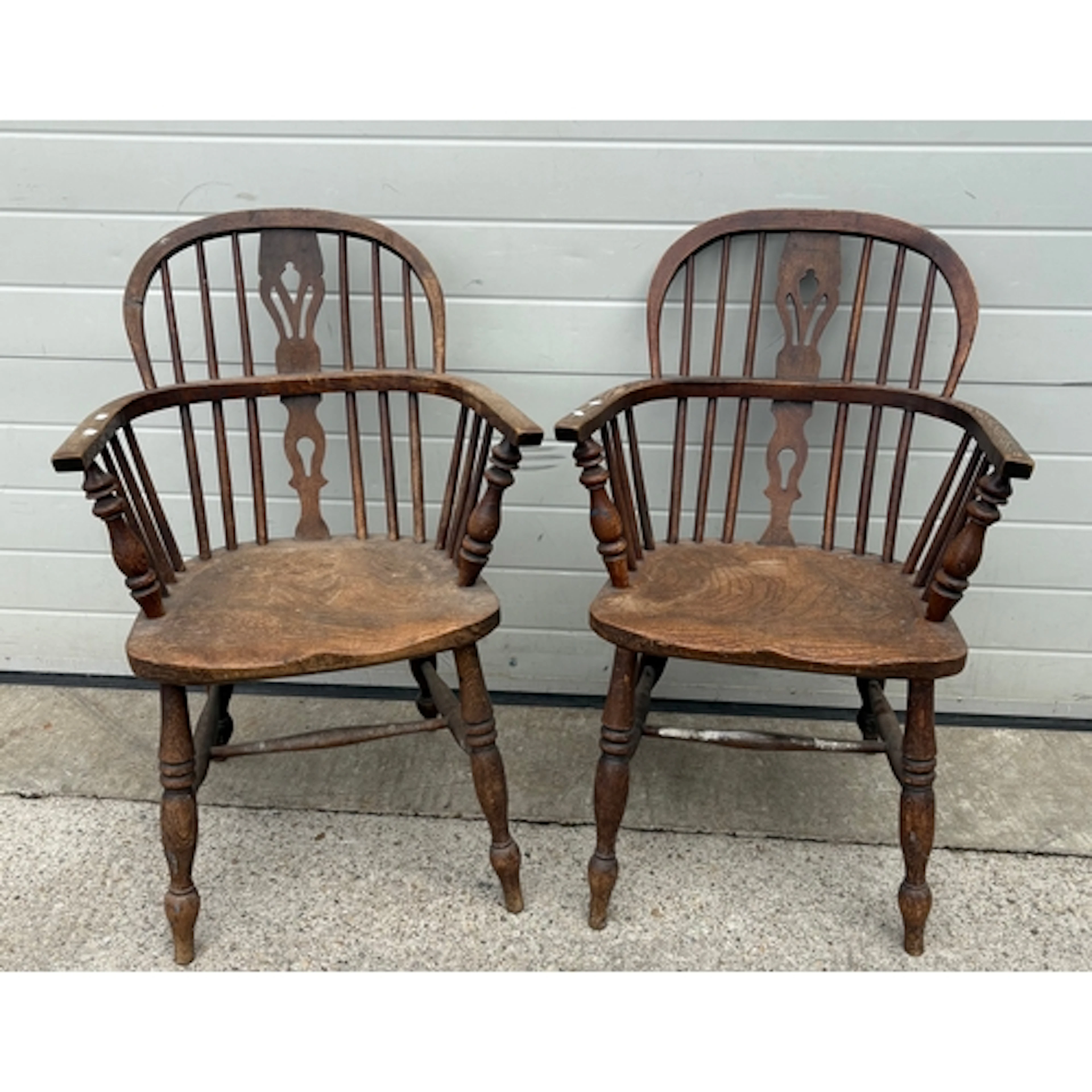 A pair of low back Windsor chairs