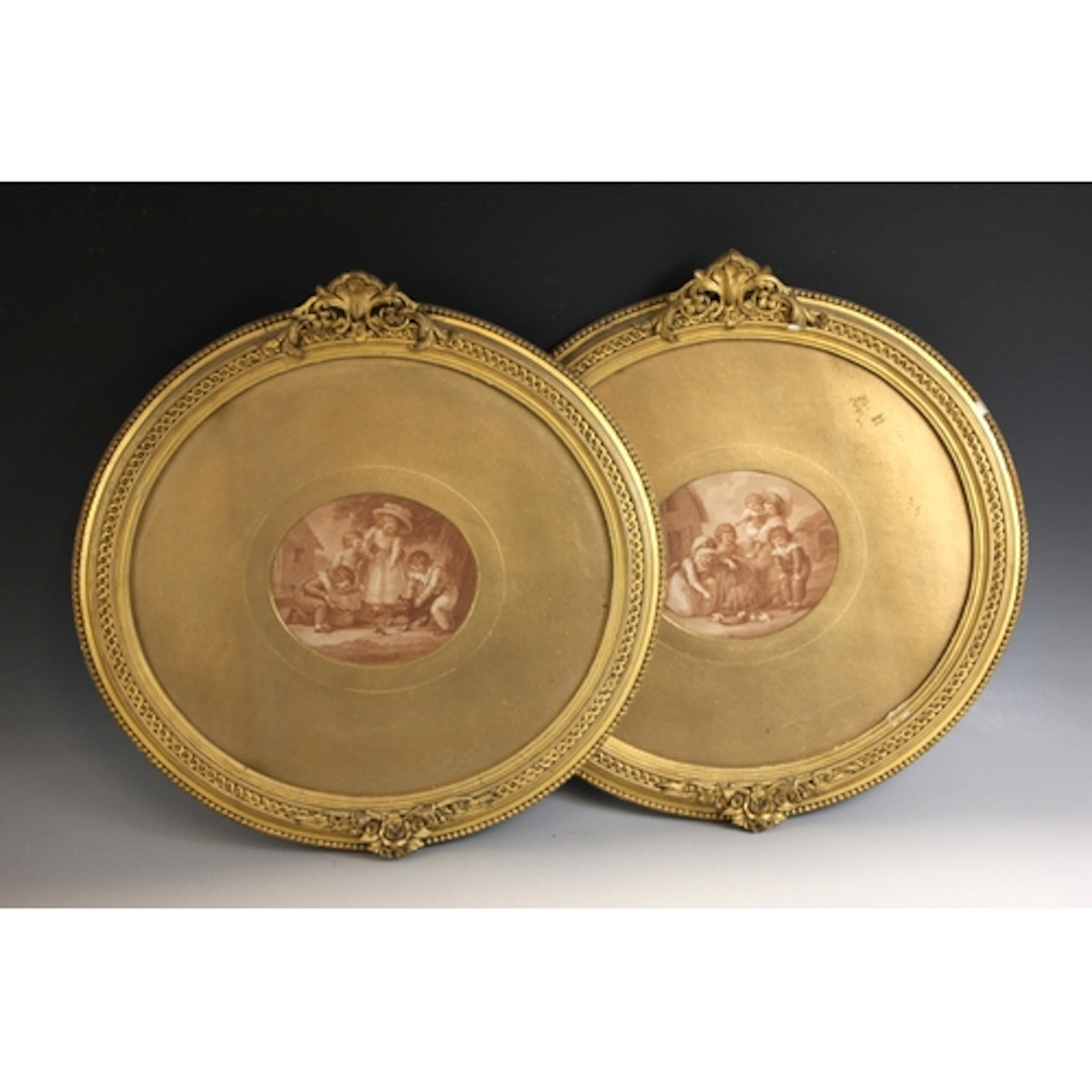 A pair of oval giltwood and gesso picture frames, 19th centu...