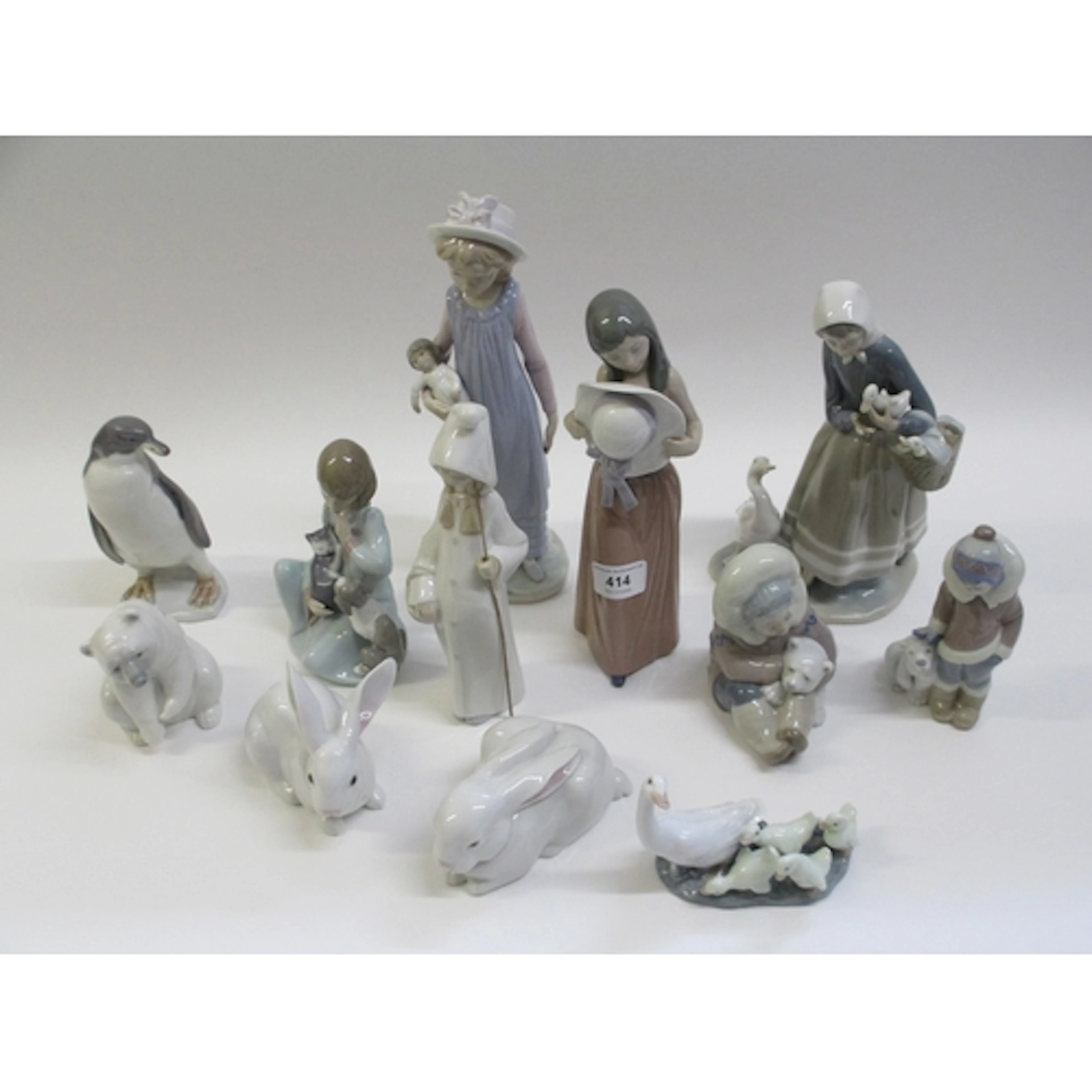 Group of twelve various Lladro figures