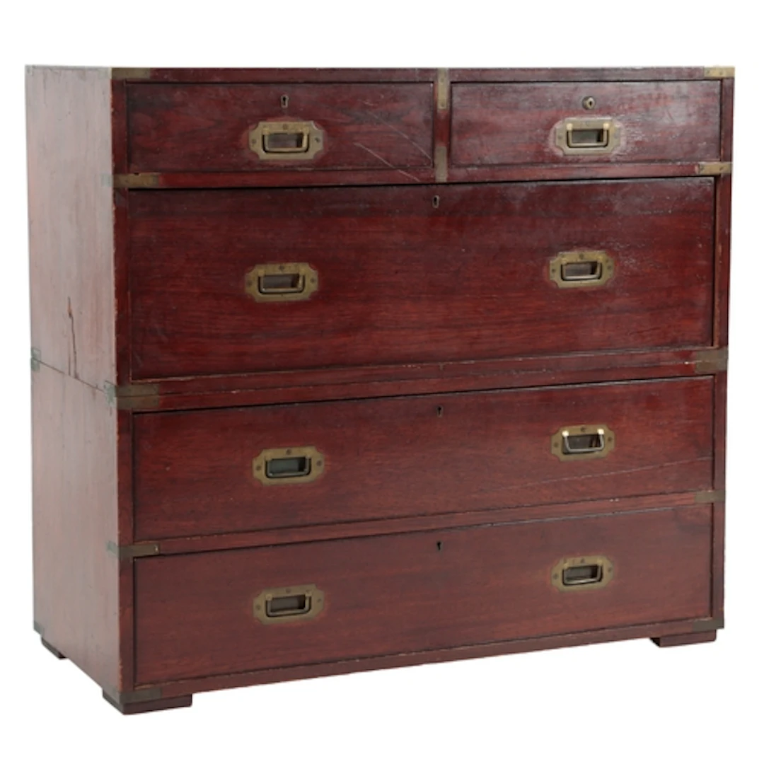 A 19th century teak campaign chest, in two sections, the upp...