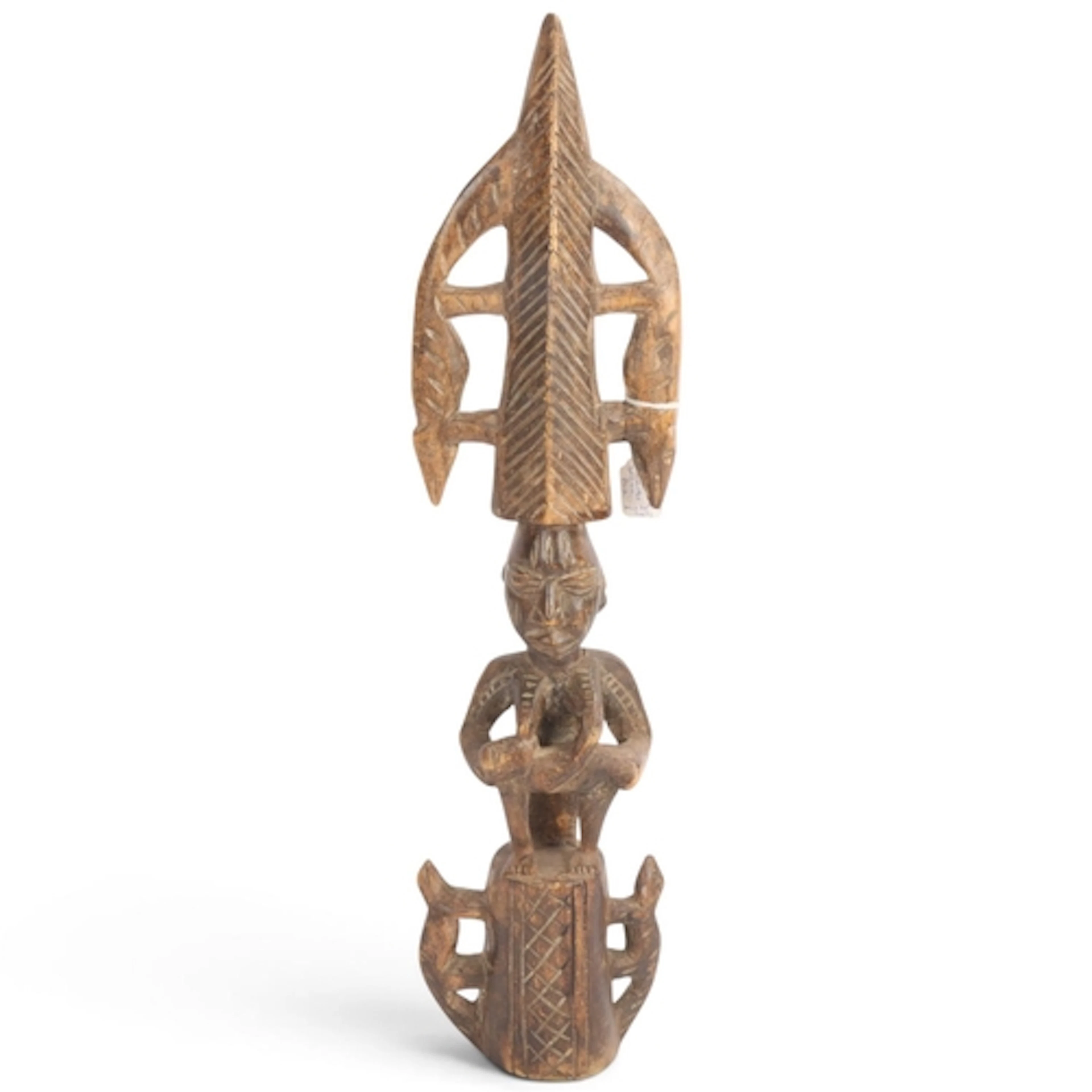 A Yoruba fertility carving, carved wood, length 51cm