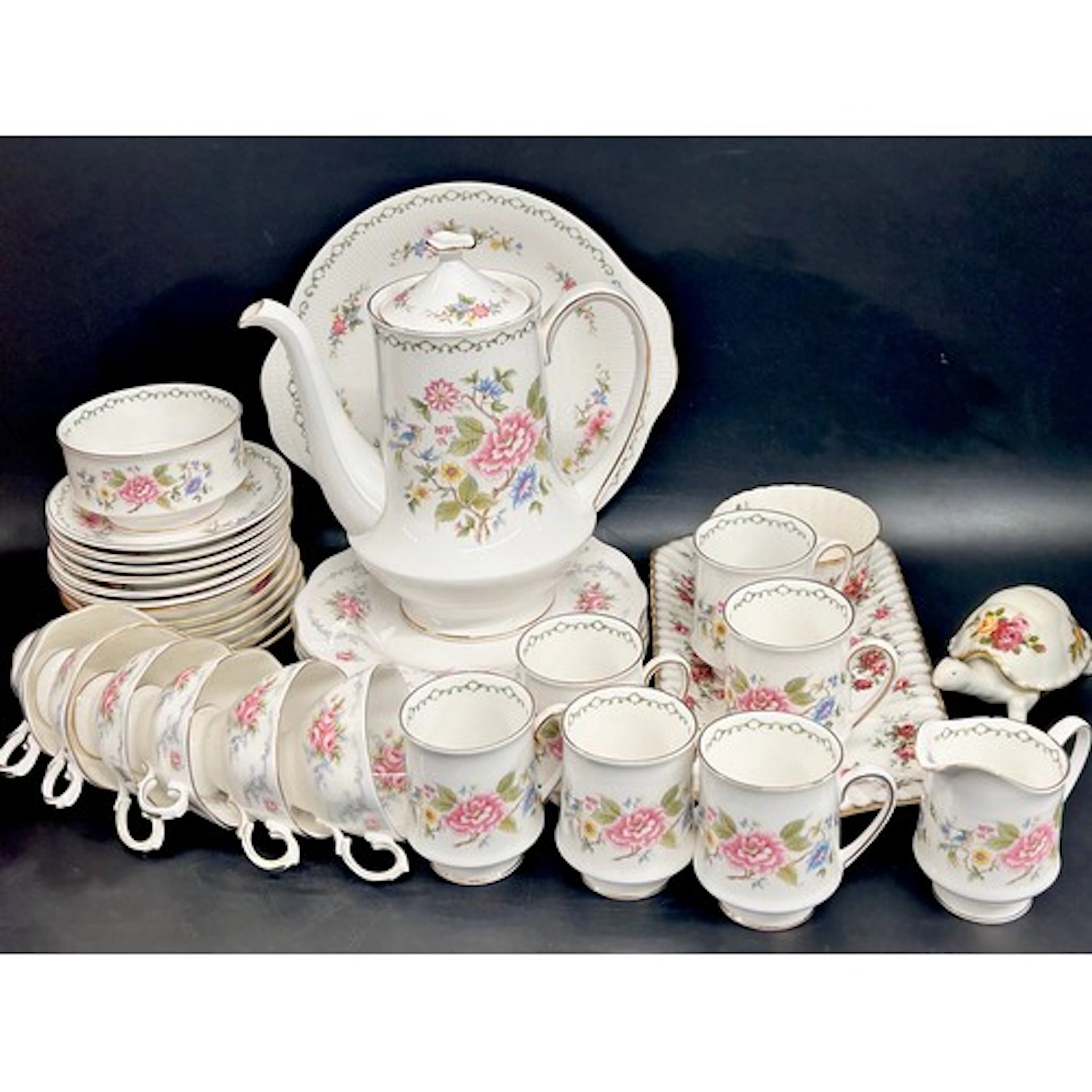 A Paragon tea service - coffee pot, cake plate, six cups/sau...