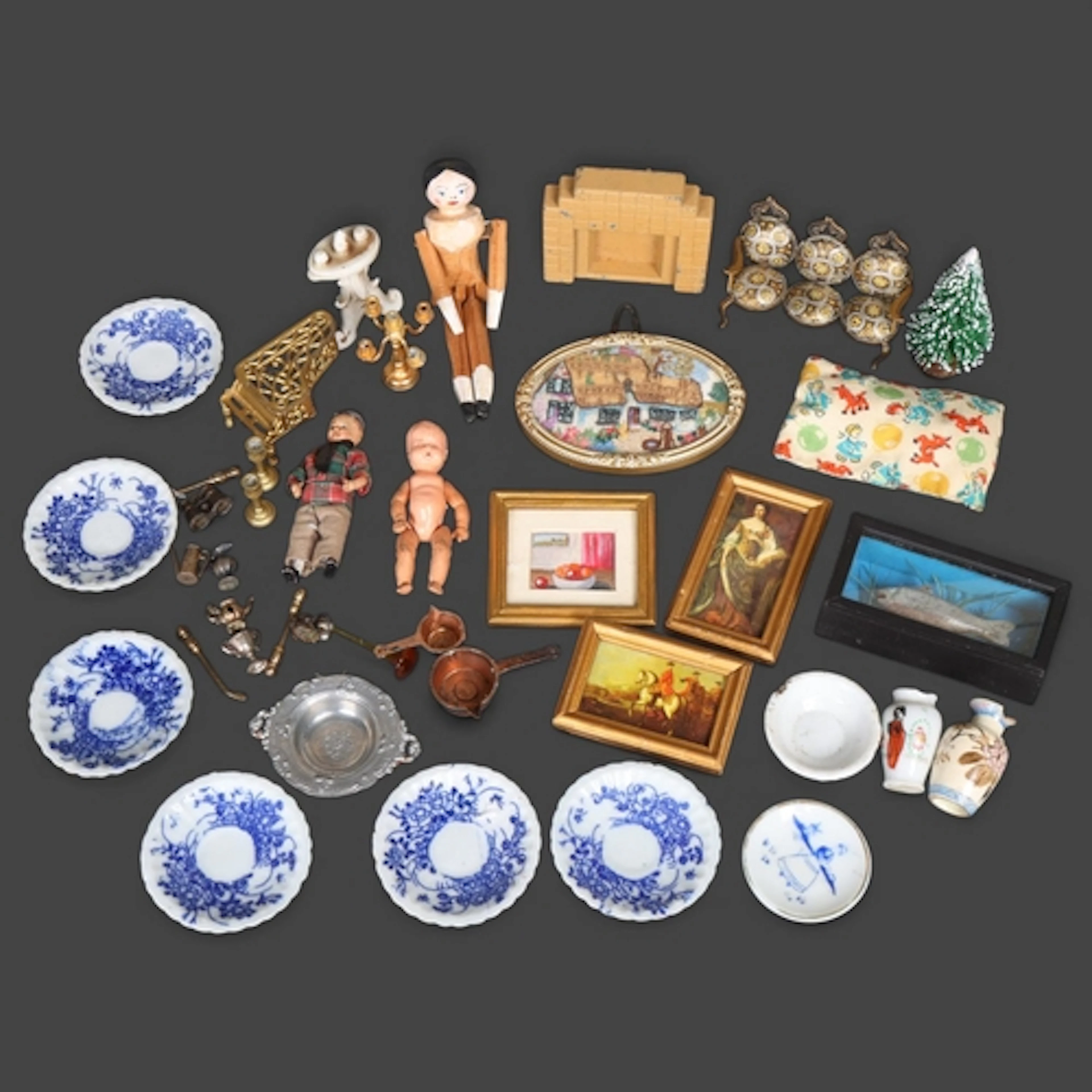 A group of doll's house ornaments, small peg doll, etc