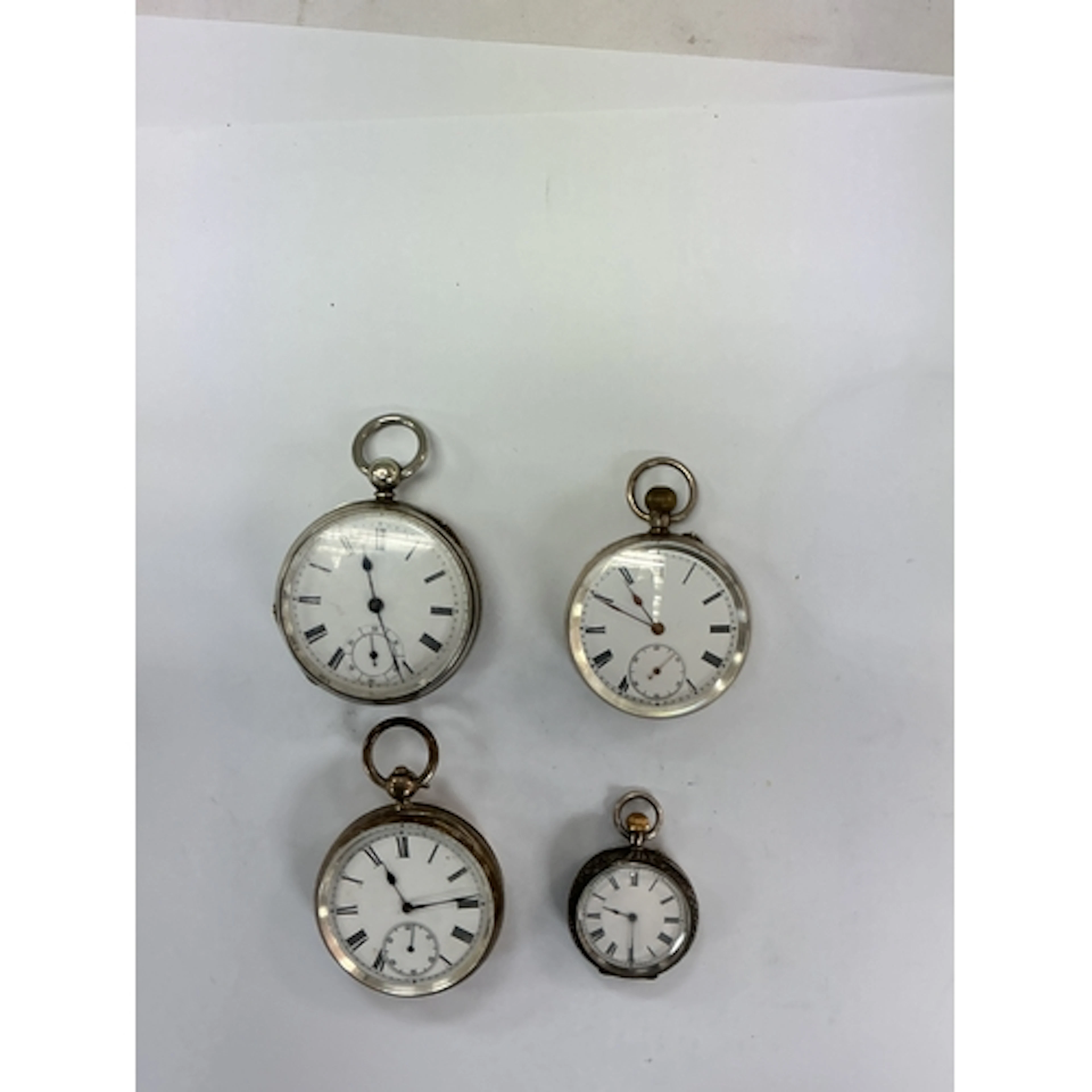 Three silver cased pocket watches, one having Swiss movement...