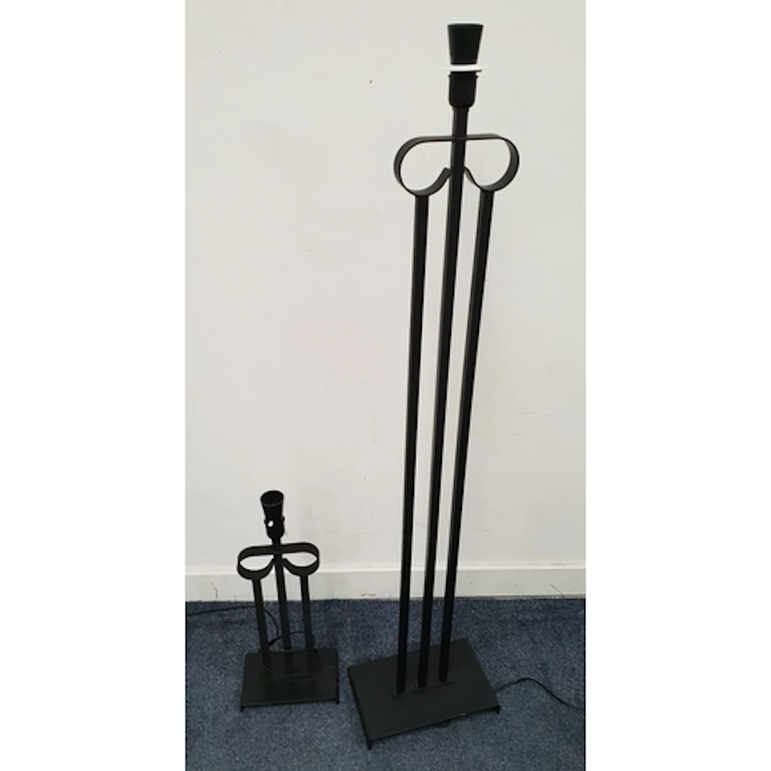 PAIR OF CONTEMPORARY LAMPS both of black painted cast metal ...