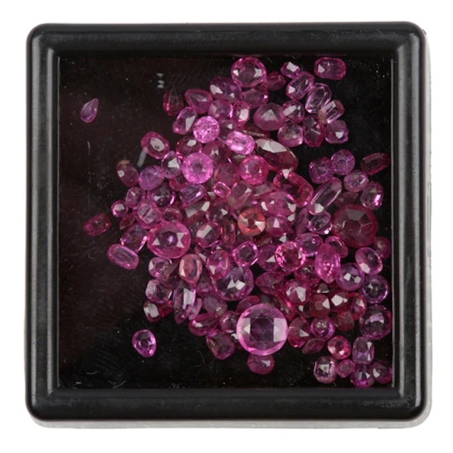 A collection of unmounted rubies, individually between appro...