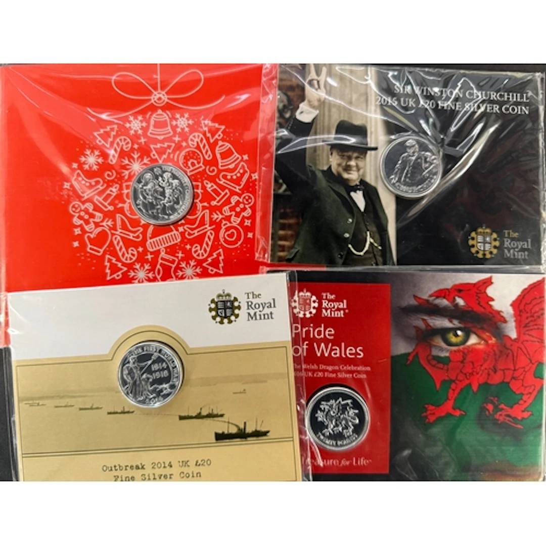 A group of four UK QEII Royal Mint brilliant uncirculated fi...