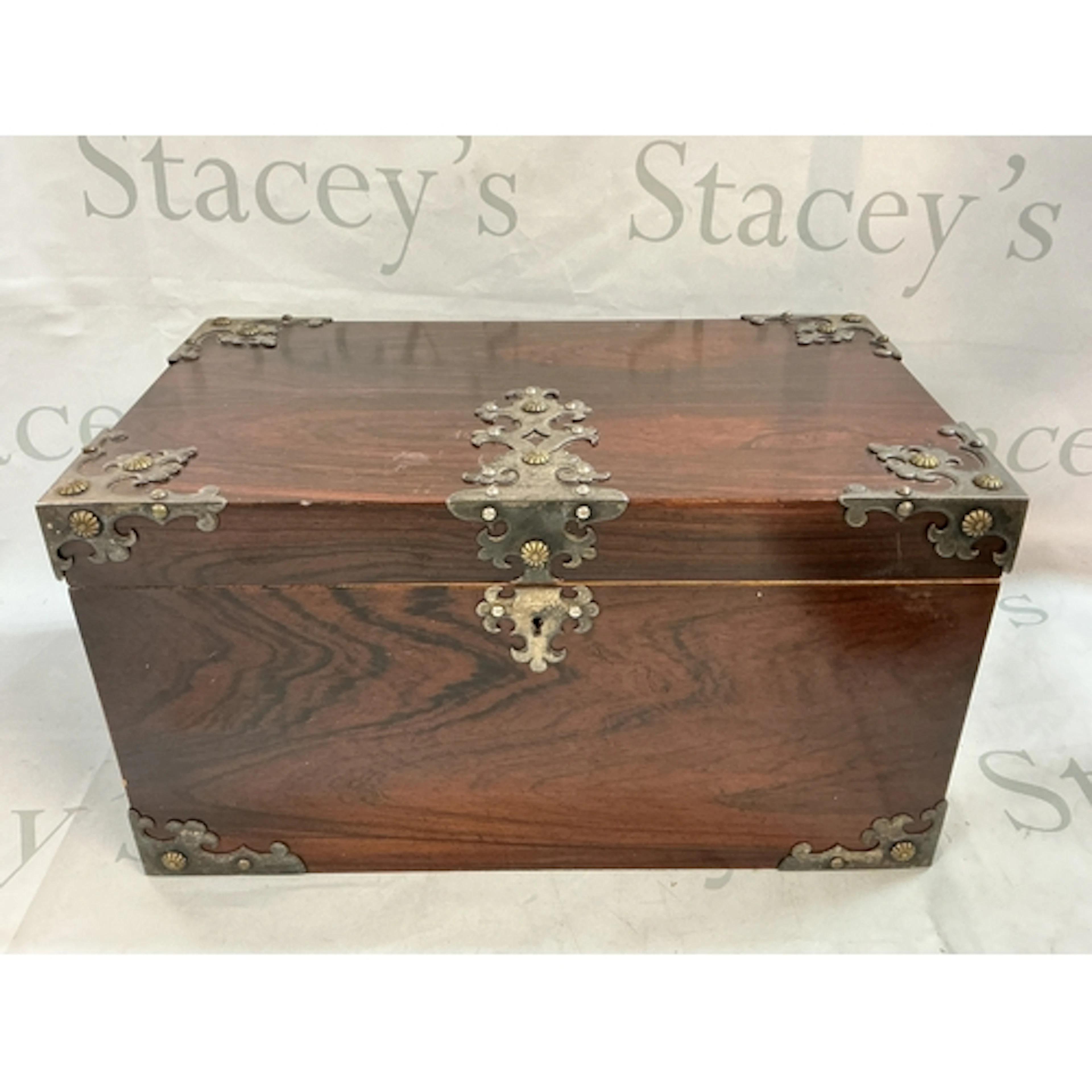 A 19th century wooden jewellery box with metal mounts and a ...