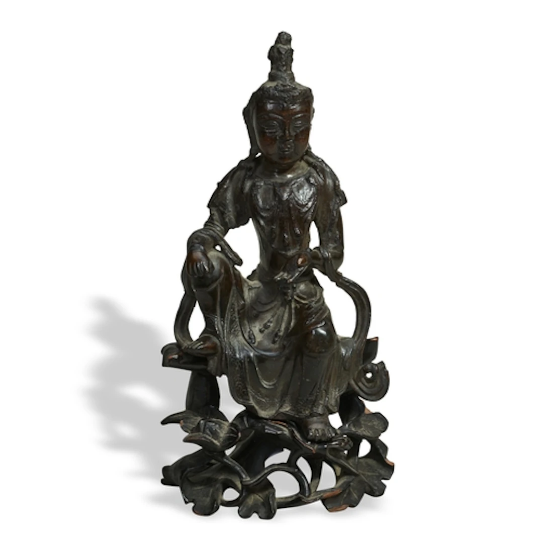A BRONZE FIGURE OF GUANYIN YUAN - EARLY MING DYNASTY traces...