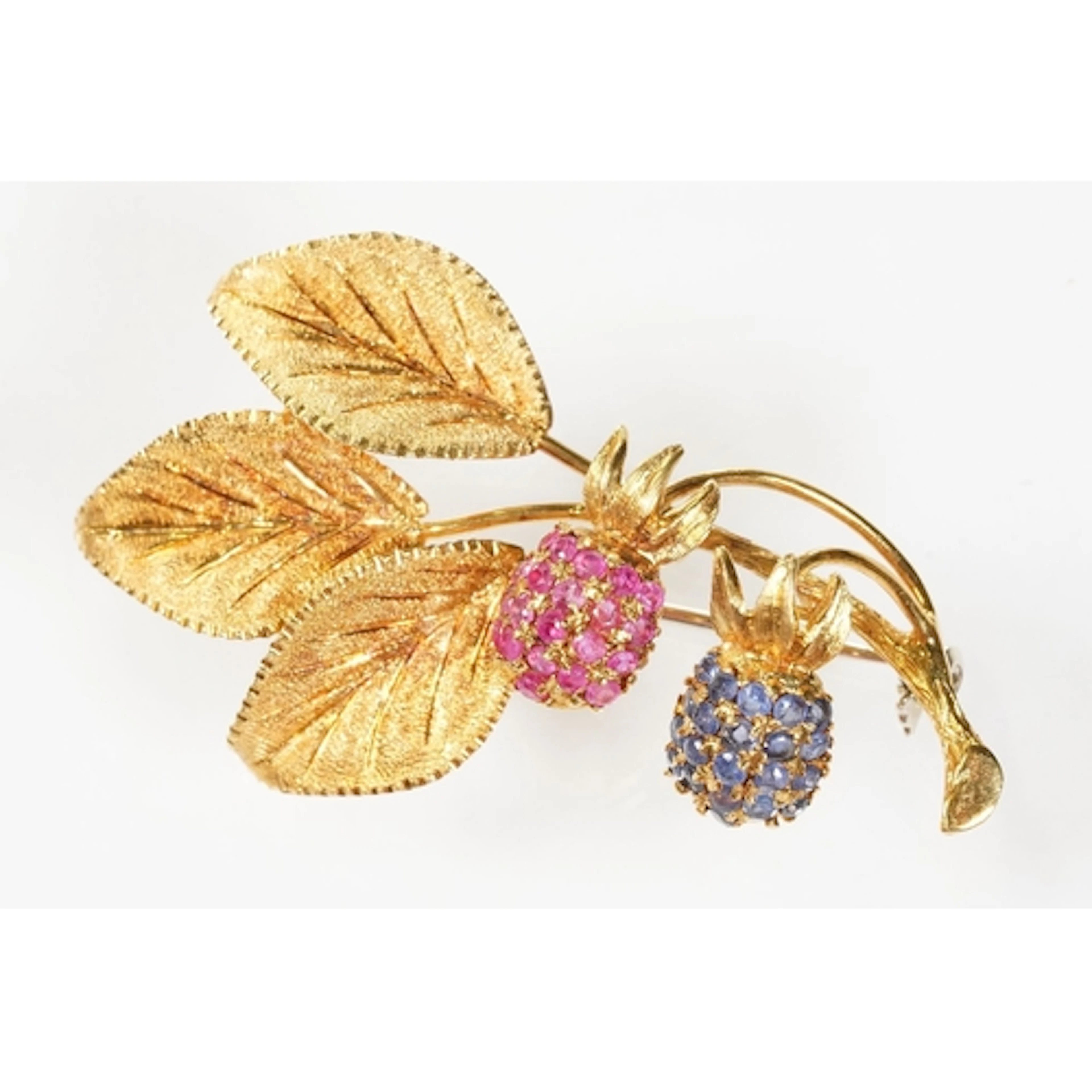 18ct gold, ruby and sapphire fruiting spray brooch. The broo...