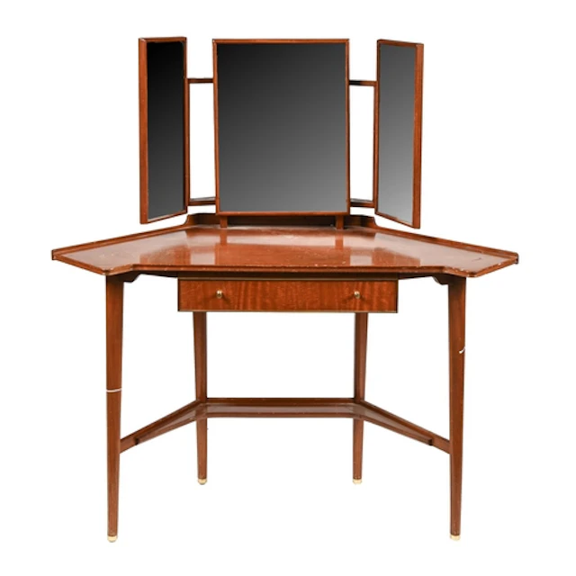 A mid-century modern teak and brass mounted dressing table, ...