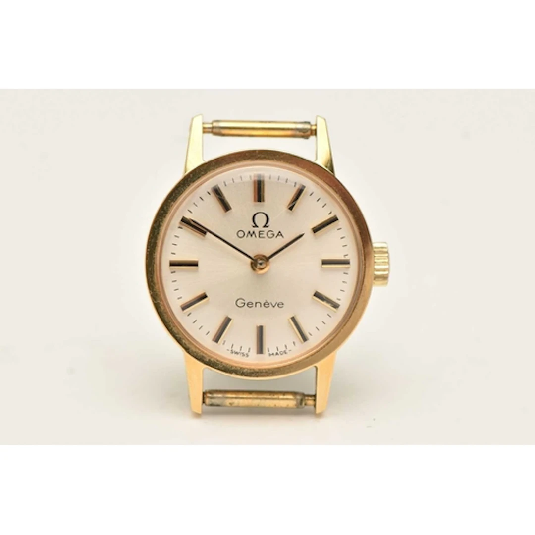 A LADIES 'OMEGA' WATCH HEAD, hand wound movement, round dial...