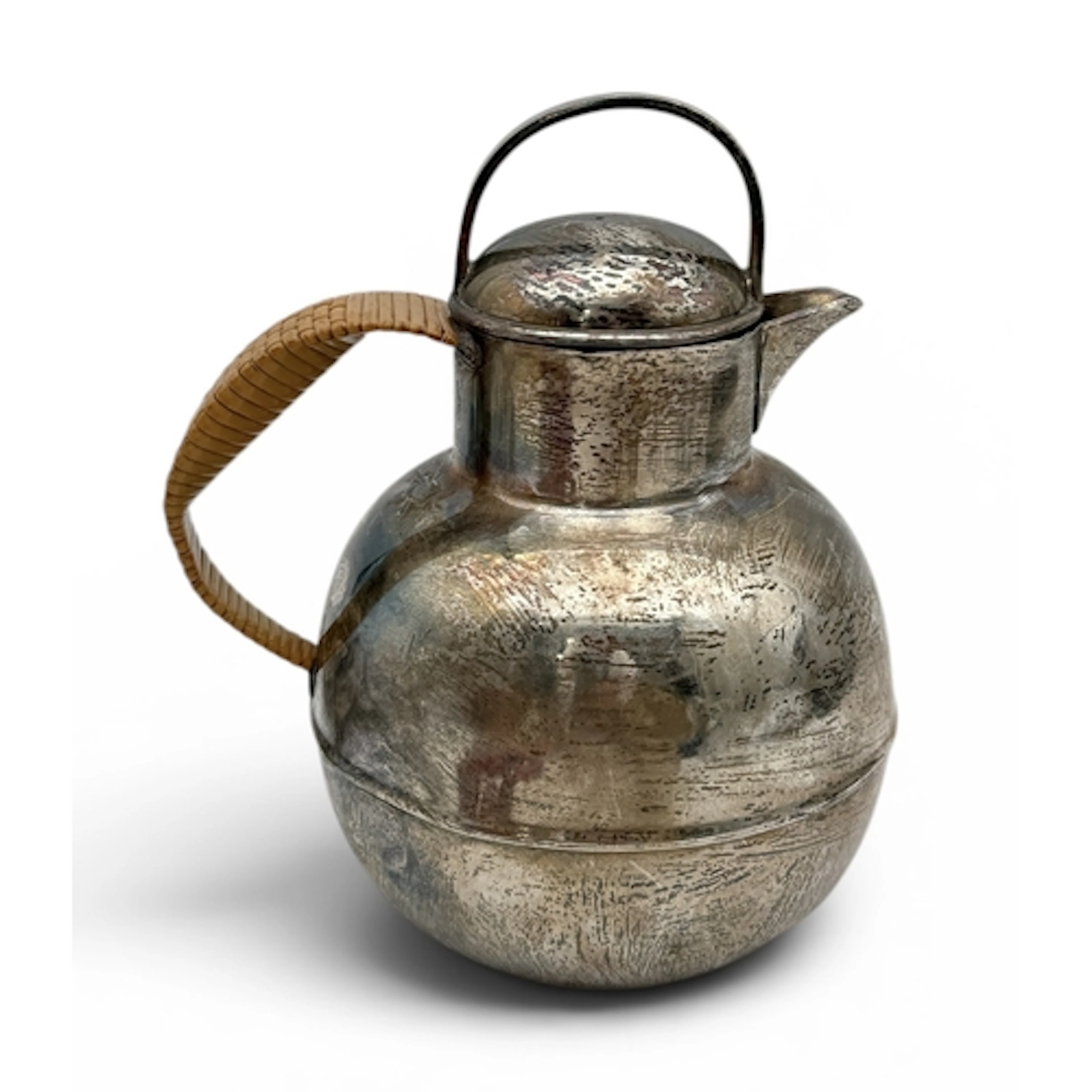 A STERLING SILVER GUERNSEY MILK JUG BY THE INTERNATIONAL SIL...