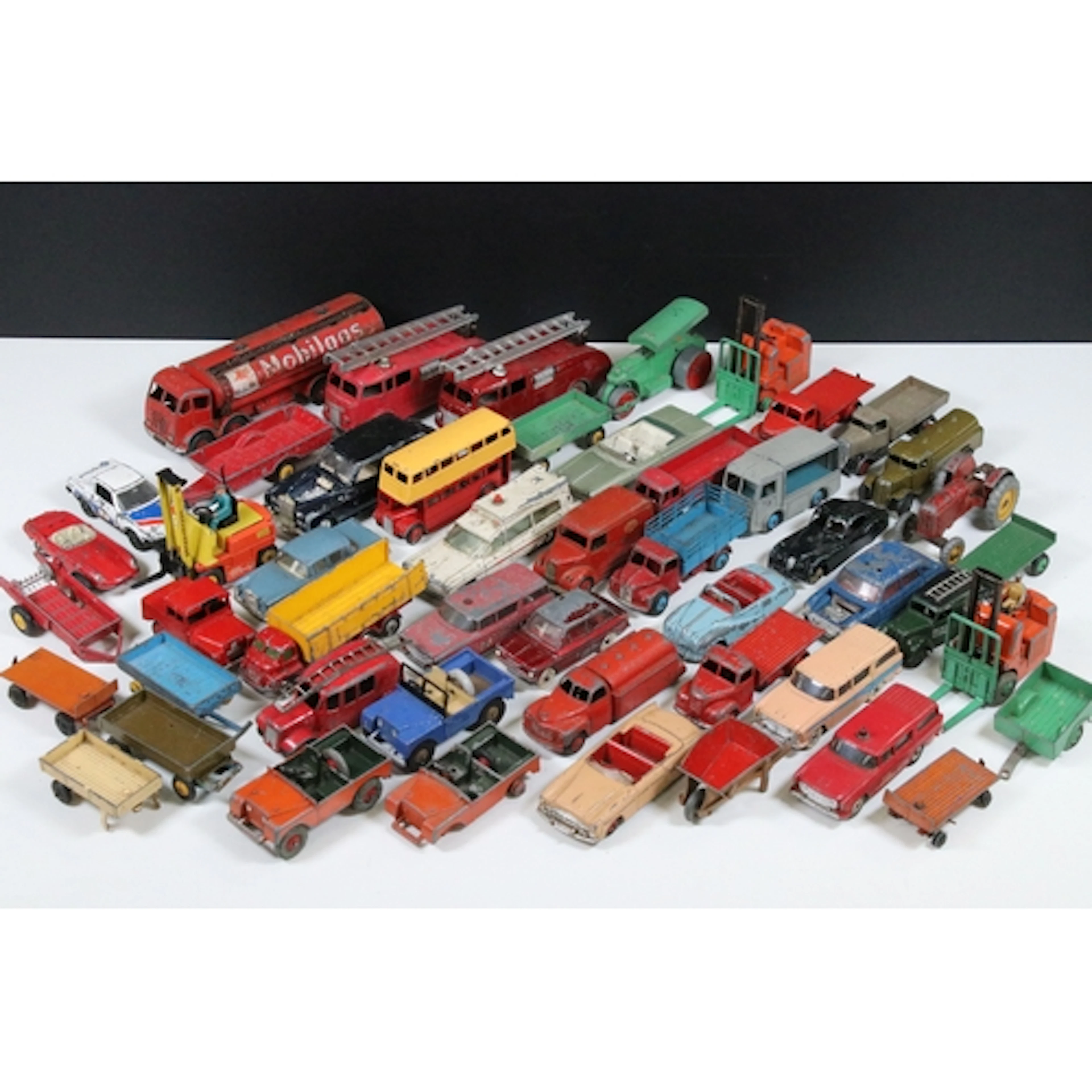 Around 50 Mid 20th C play worn diecast models to include Din...
