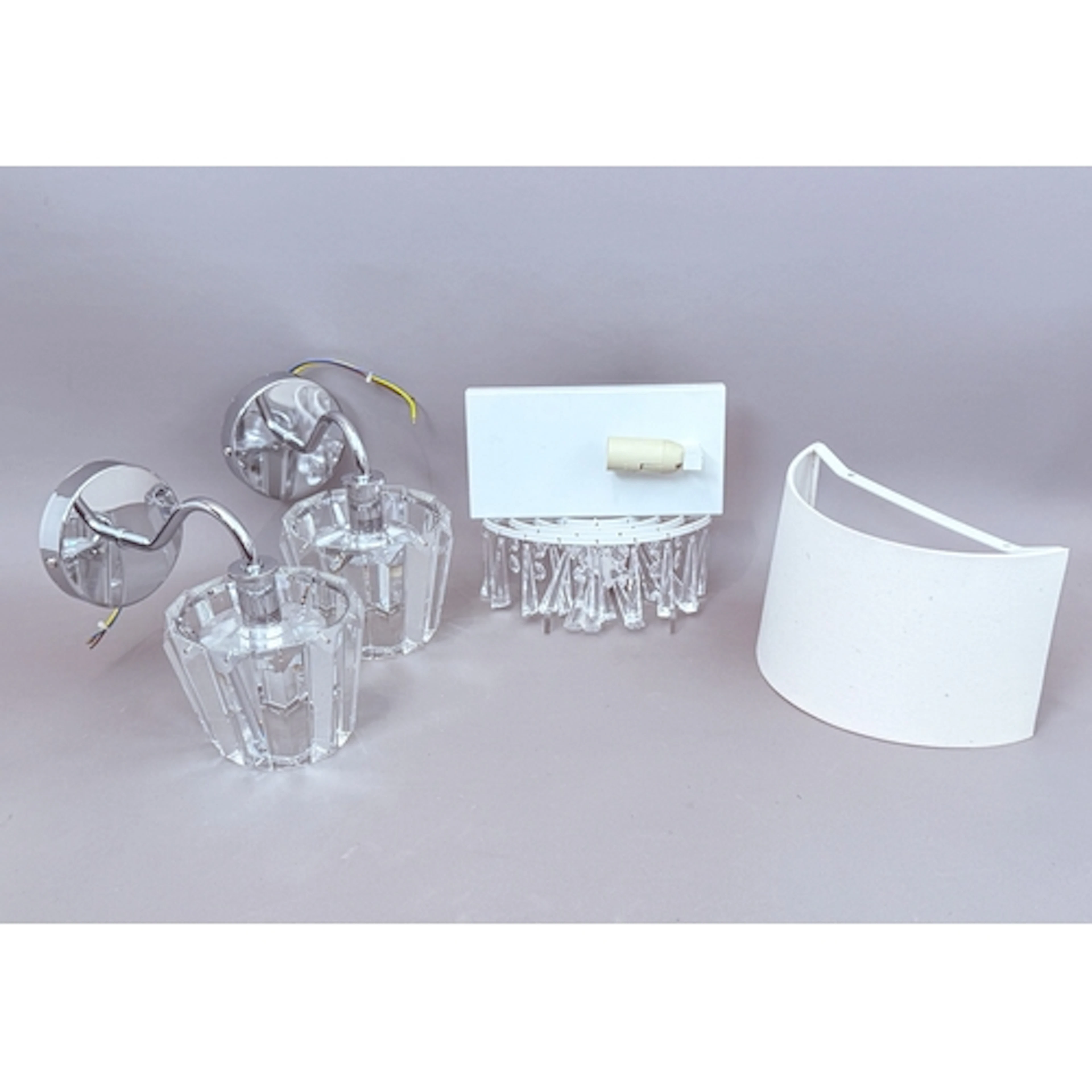 A pair of 'Capri' cut glass and chrome wall lights by Laura ...