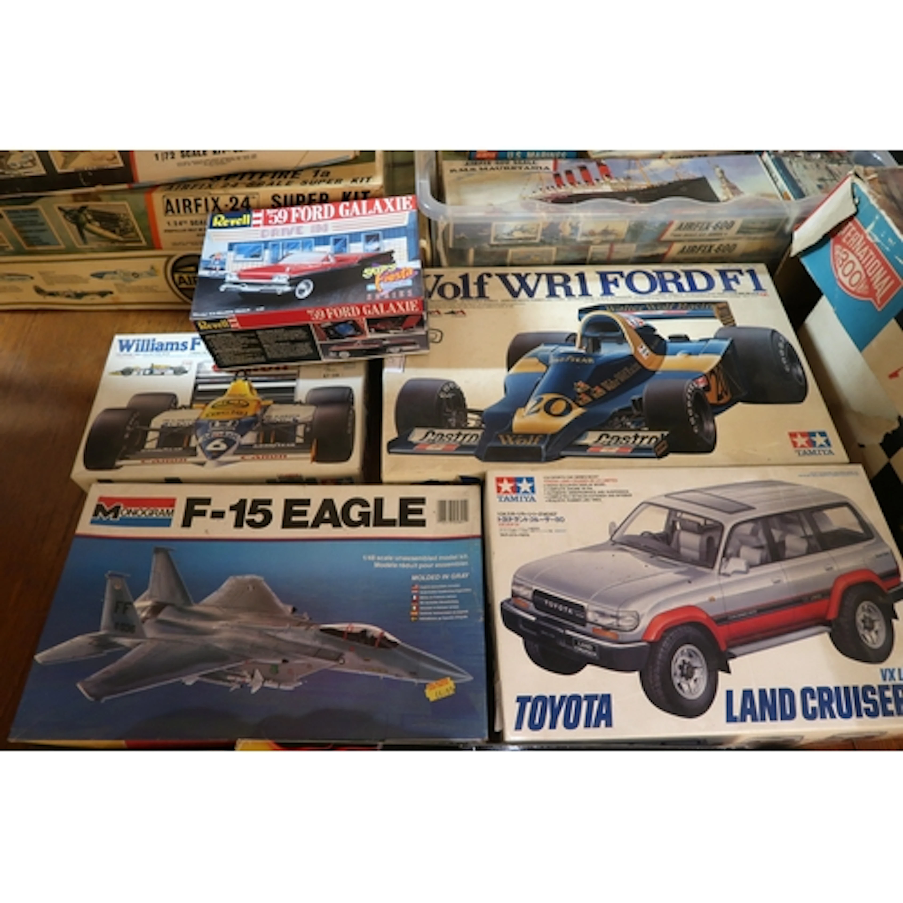 Six various boxed un-built construction kits by Tamiya, Reve...