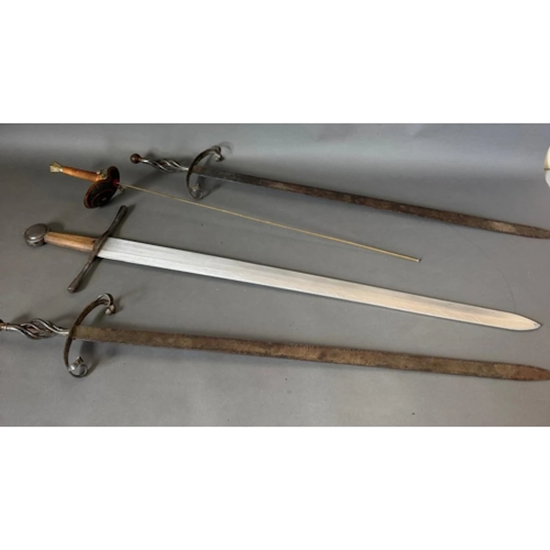 A Medieval style long sword and scabbard.