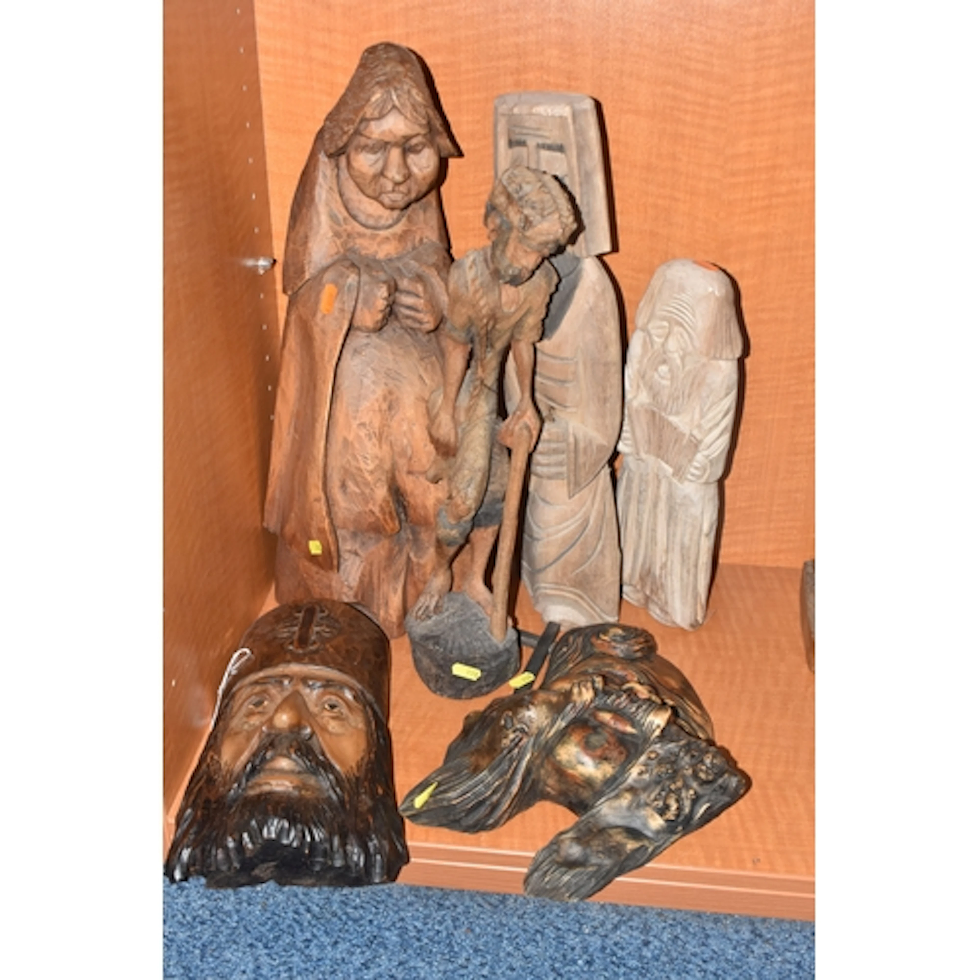 SIX CARVED FOLK ART ITEMS comprising a sculpture of an accor...