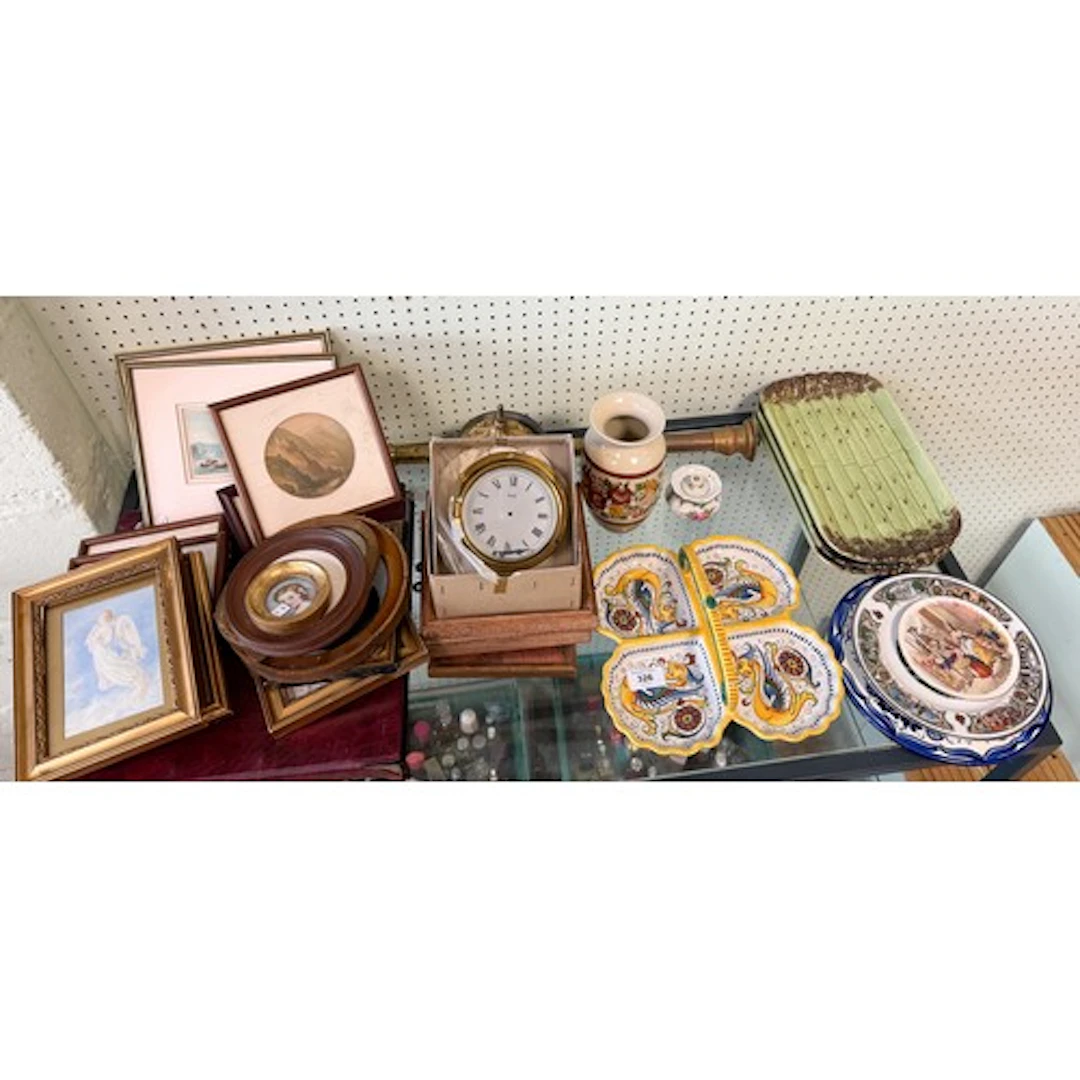 Assorted small pictures together with a ship's type clock, a...