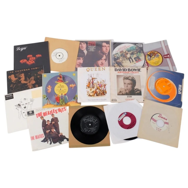 A small collection of vinyl 45 singles, including a signed R...