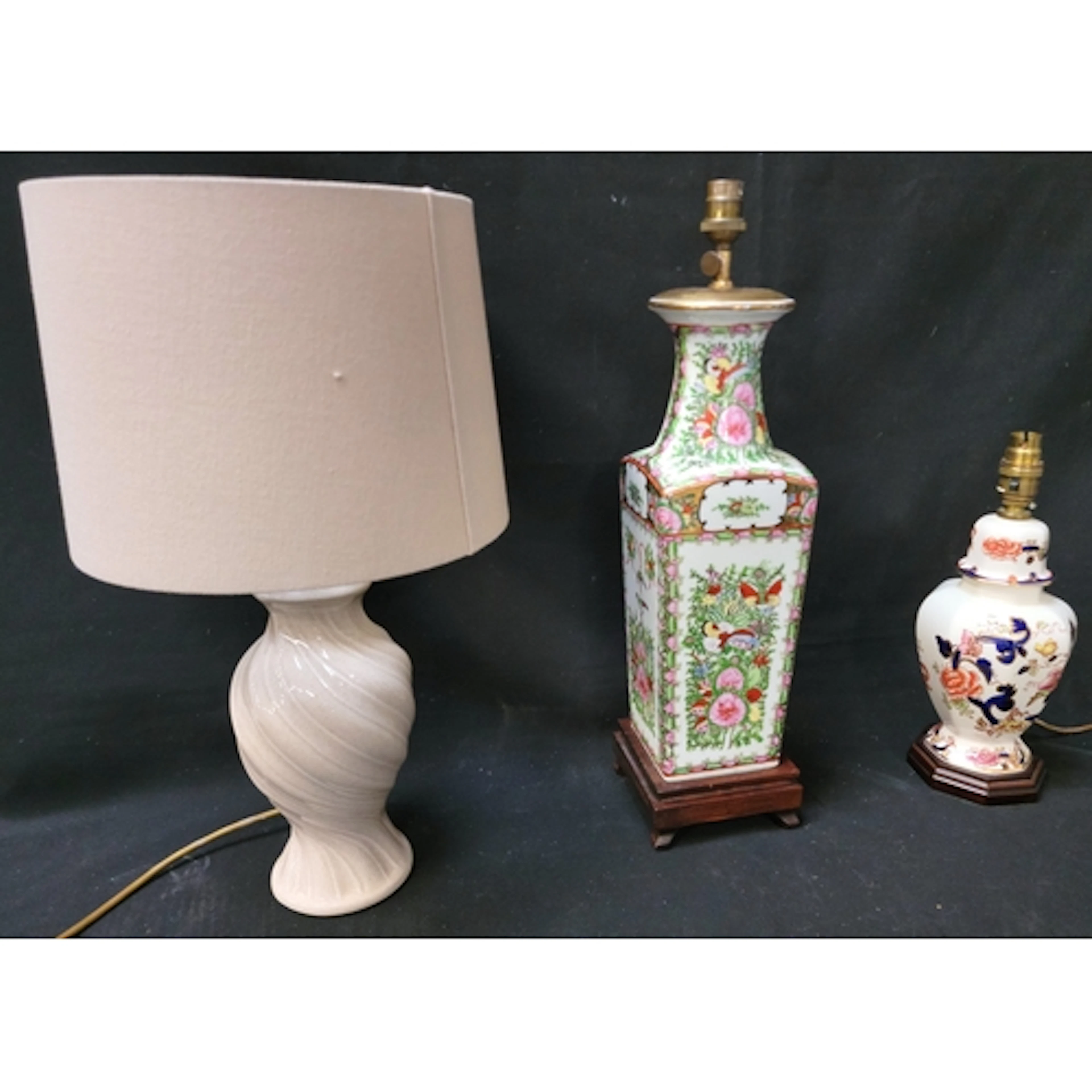 SELECTION OF THREE LAMPS comprising a Familie Rose vase styl...