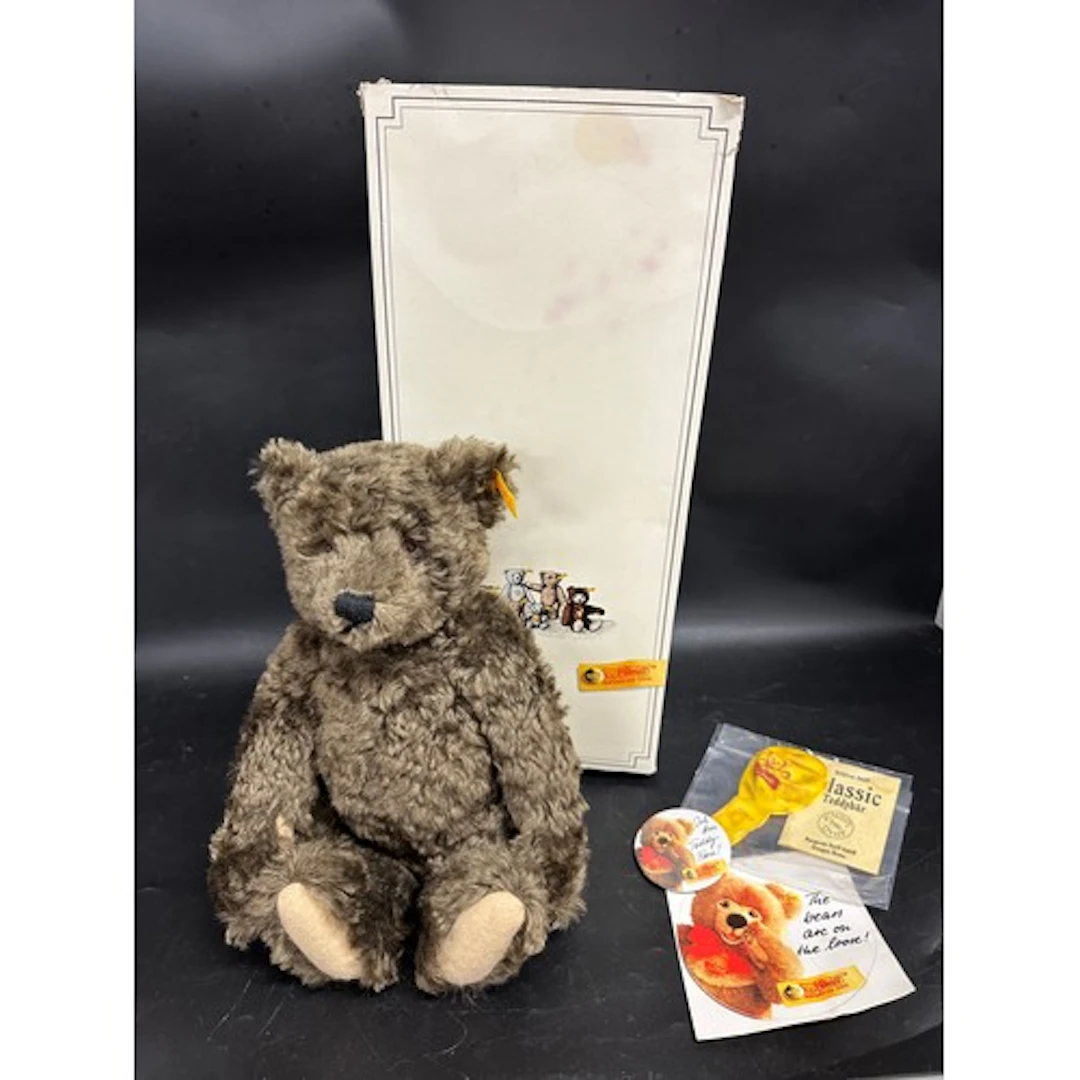 A Steiff Teddy bear with growler, also with box, certificate...