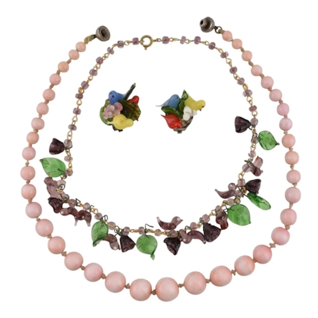 A selection of costume jewellery to include a French simulat...