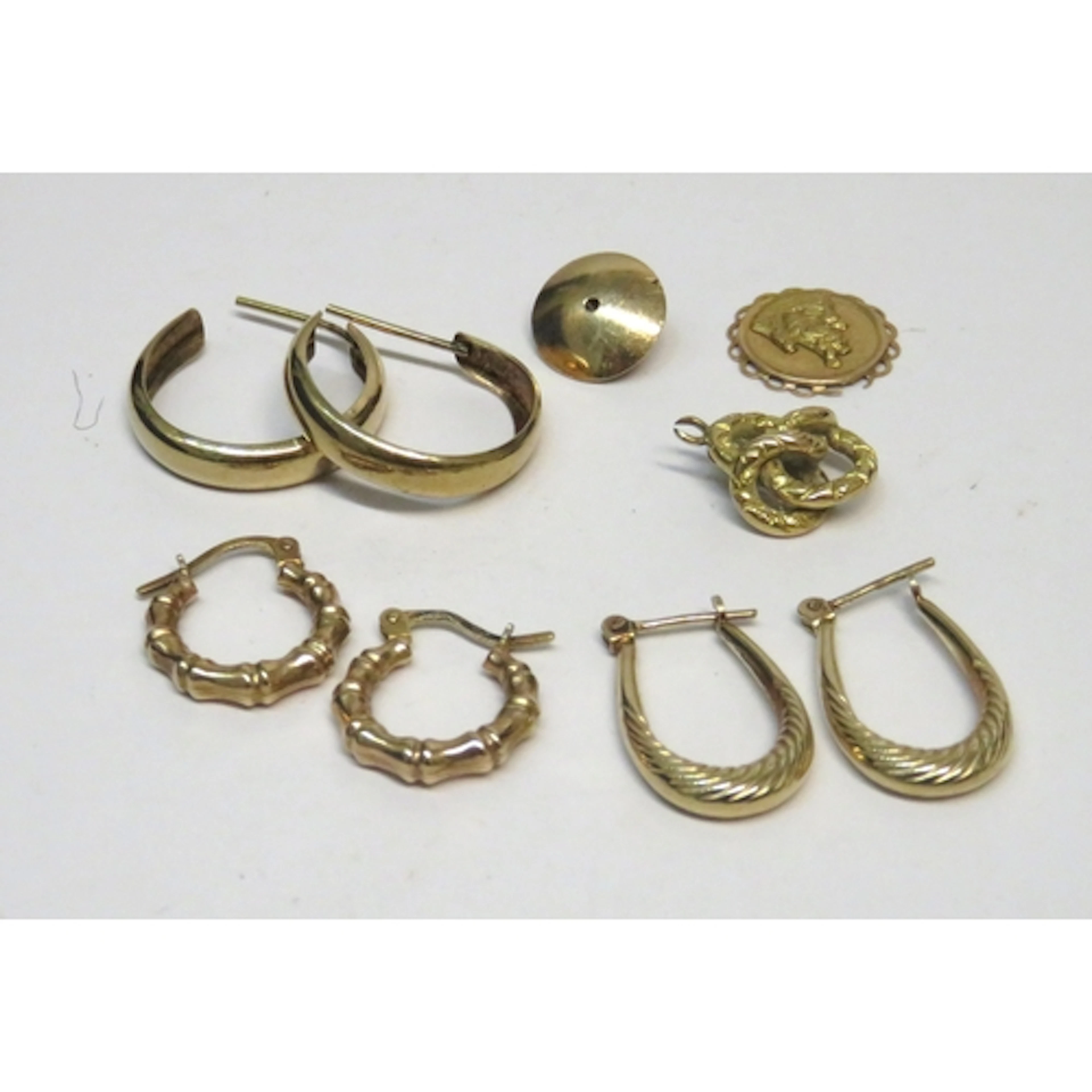 Three pairs of 9ct gold earrings, three other items, 7.5g to...