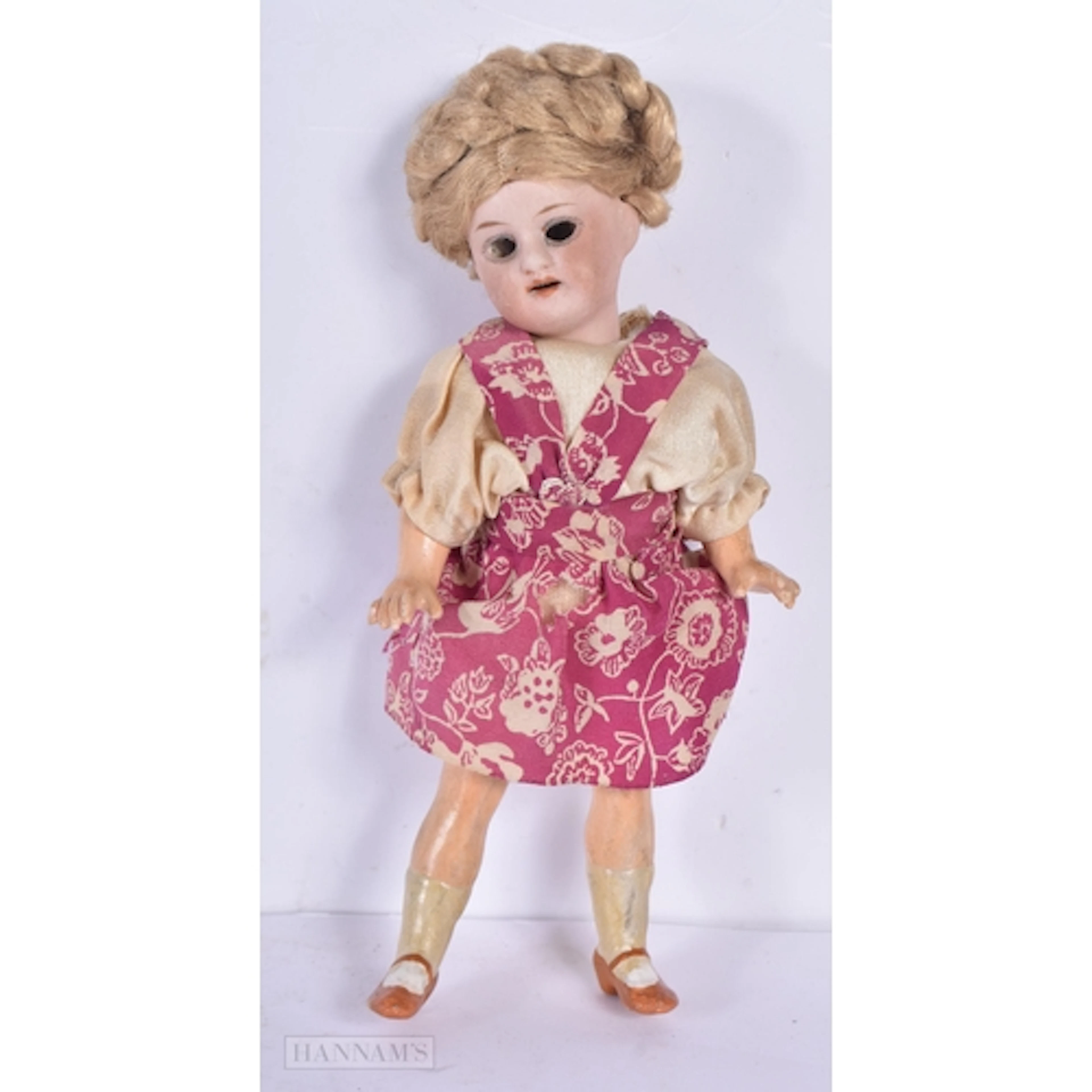A small antique bisque head doll 18.5cm