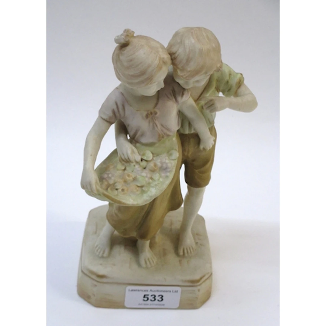 Royal Vienna bisque group of two children, 20cm high