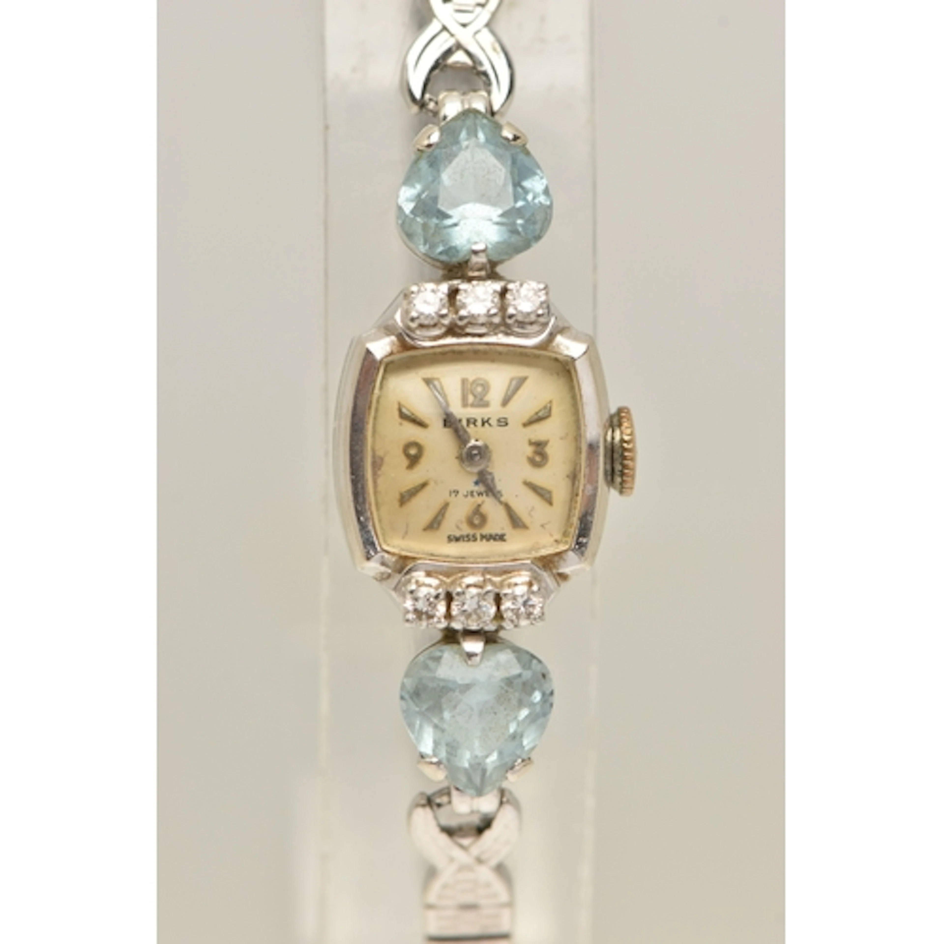 A DIAMOND AND GEM SET 'BIRKS' COCKTAIL WRISTWATCH, manual wi...