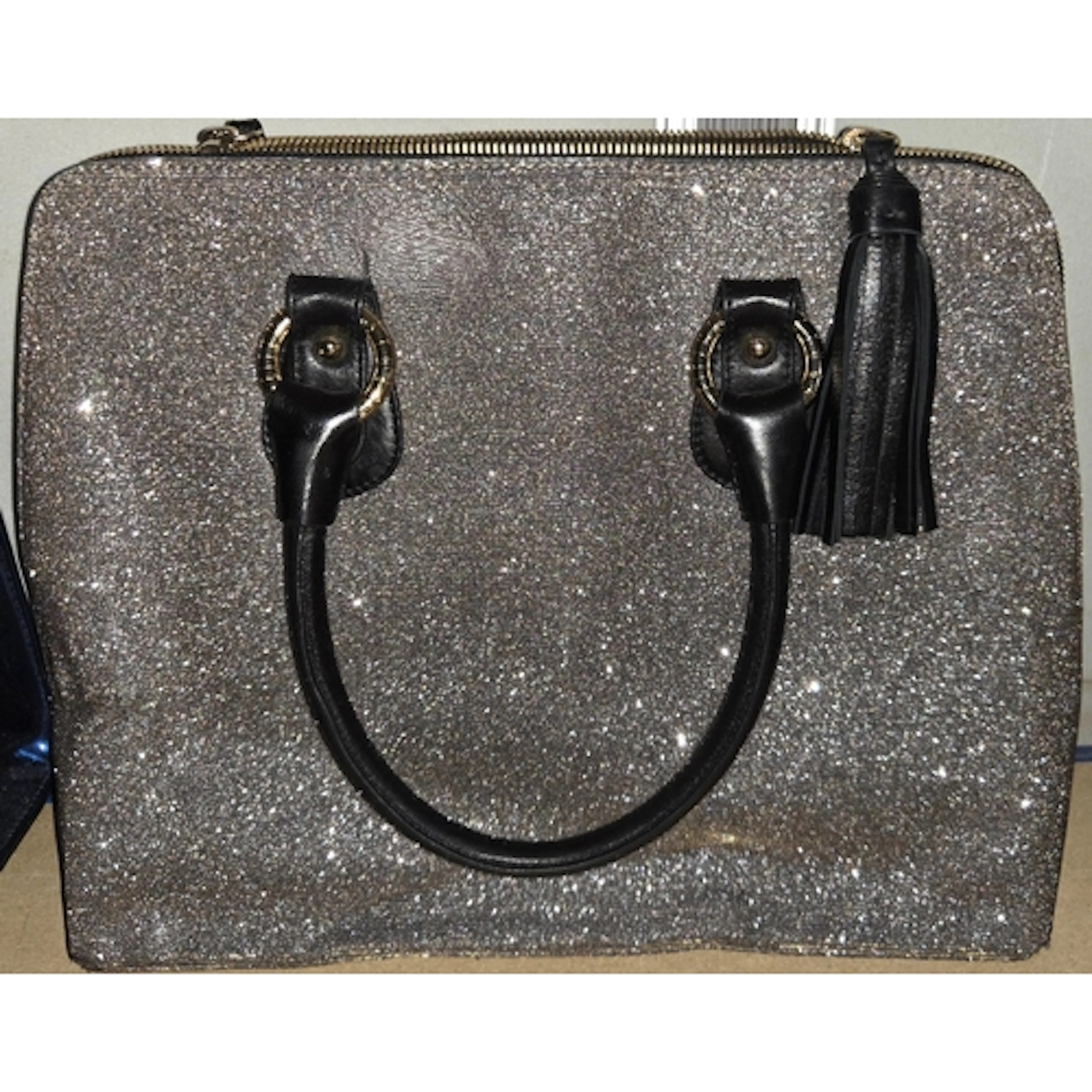 Russell and Bromley handbag designed by Stuart Weitzmar shim...