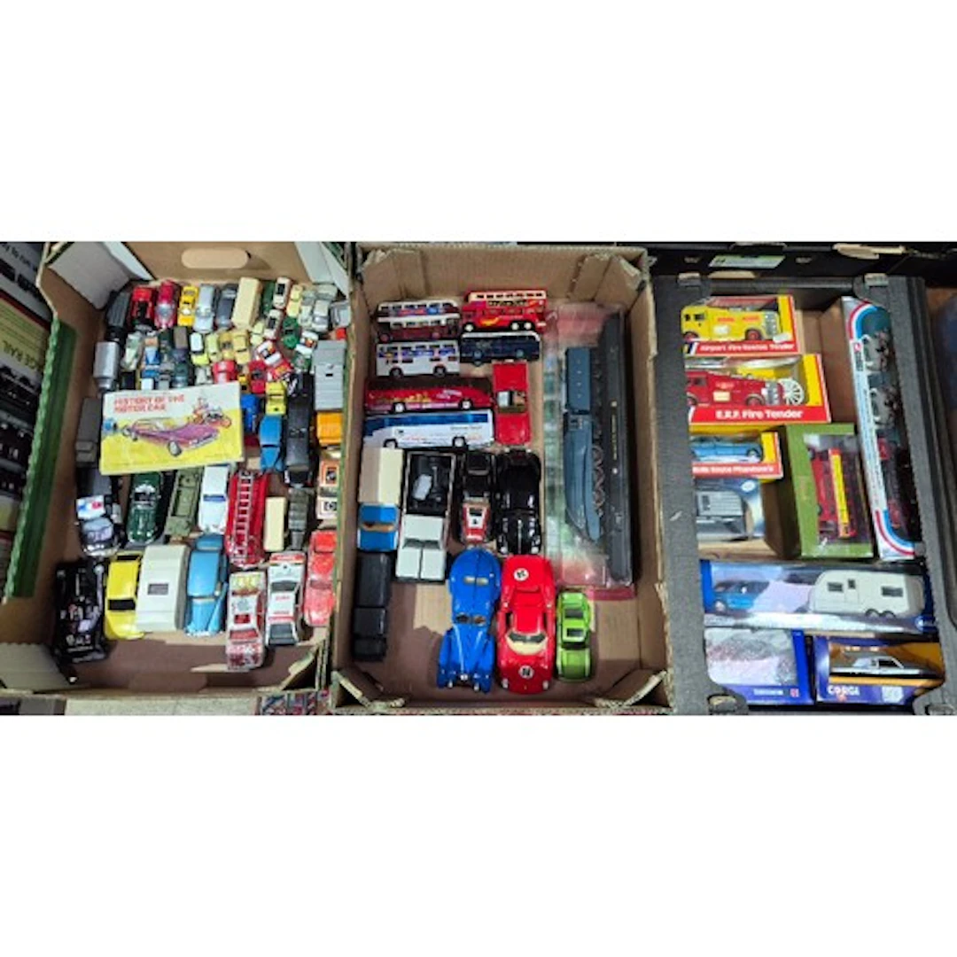 Three boxes of assorted diecast vehicles to include Corgi, D...