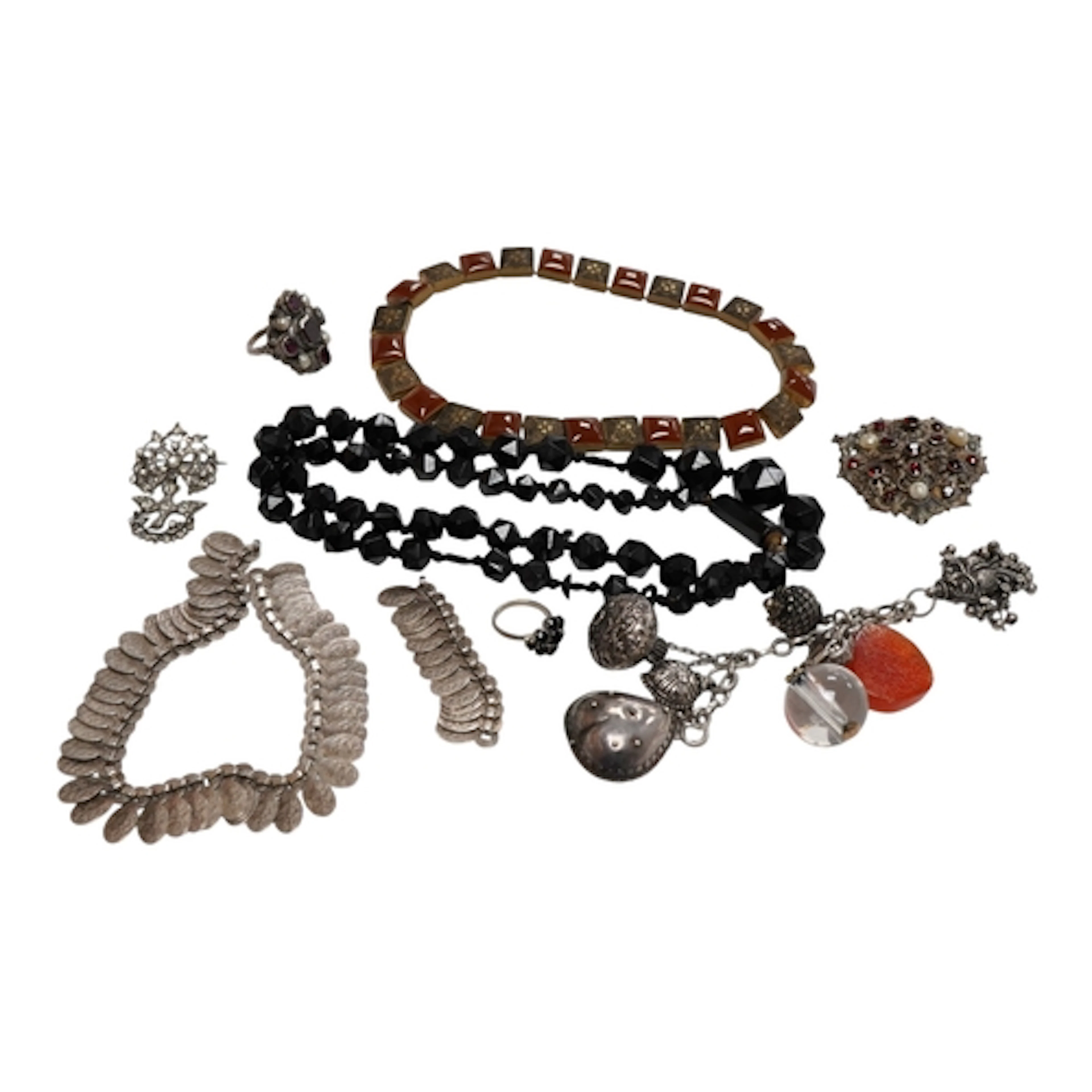 A collection of jewels including a facetted jet bead necklac...