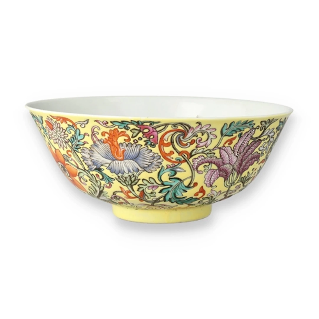 A CHINESE IMPERIAL STYLE YELLOW BOWL With four character mar...