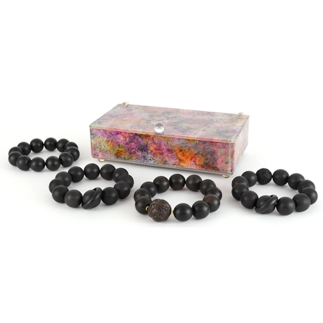 Four Chinese carved wooden bead bracelets, two with Chinese ...