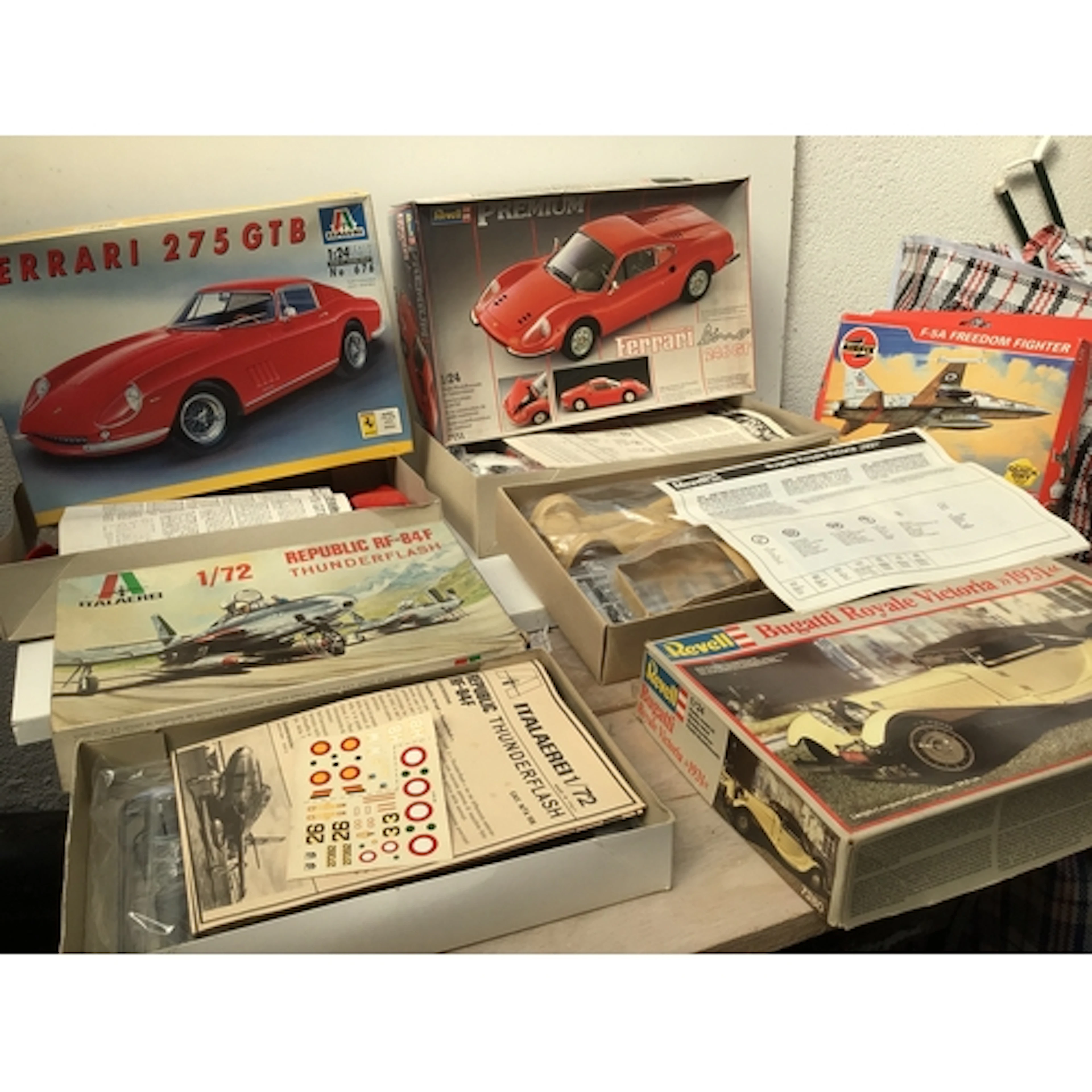 A collection of boxed model kits featuring Cars and aircraft...
