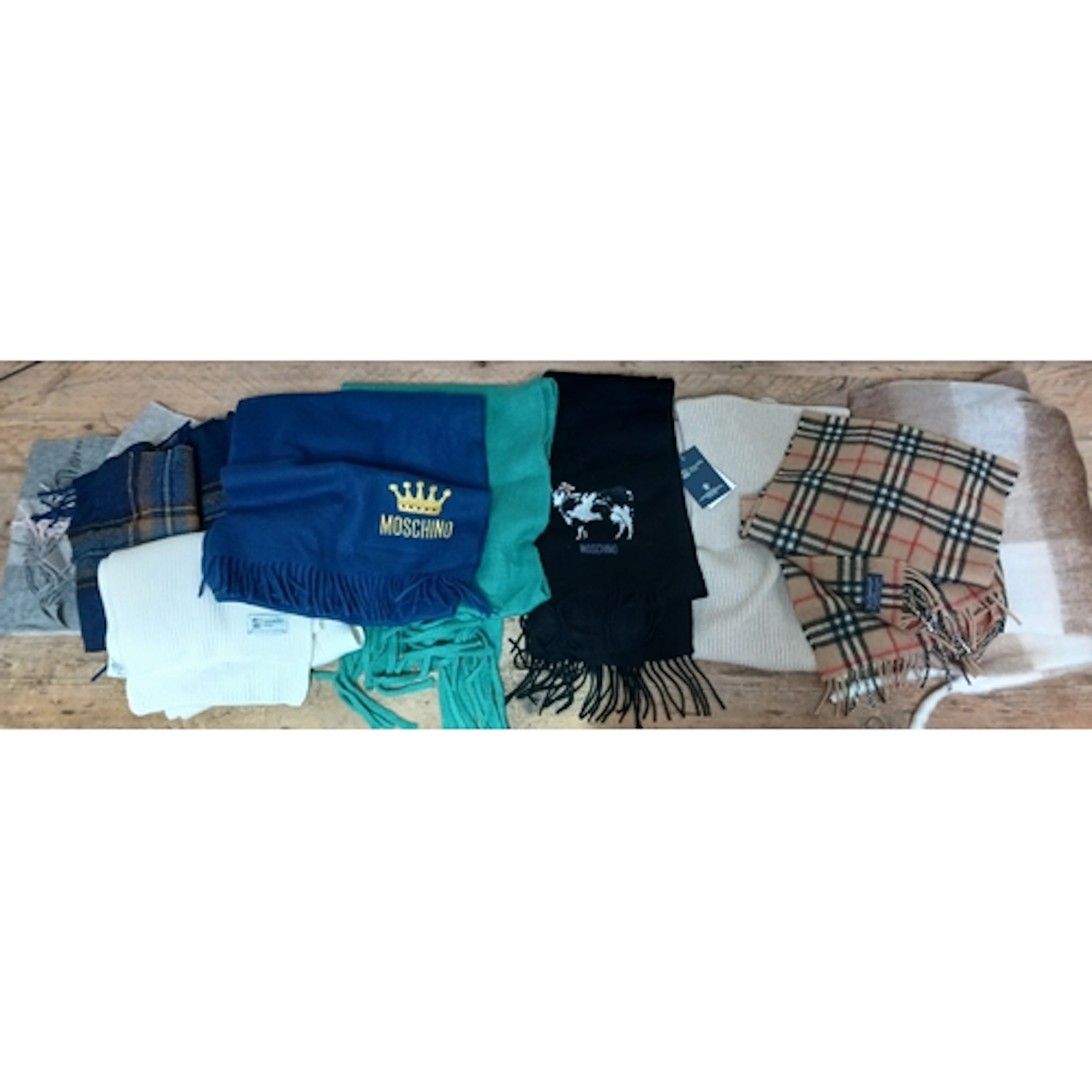 A collection of mainly wool scarves including Moschino, Burb...