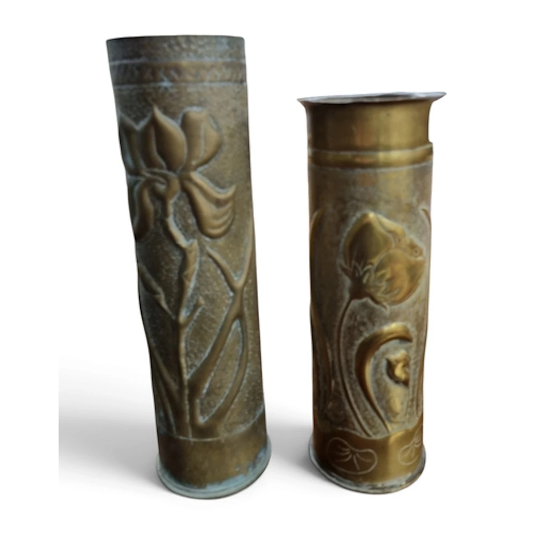 Two Brass Trenchard Shells c1916-17 along with a pair of ear...