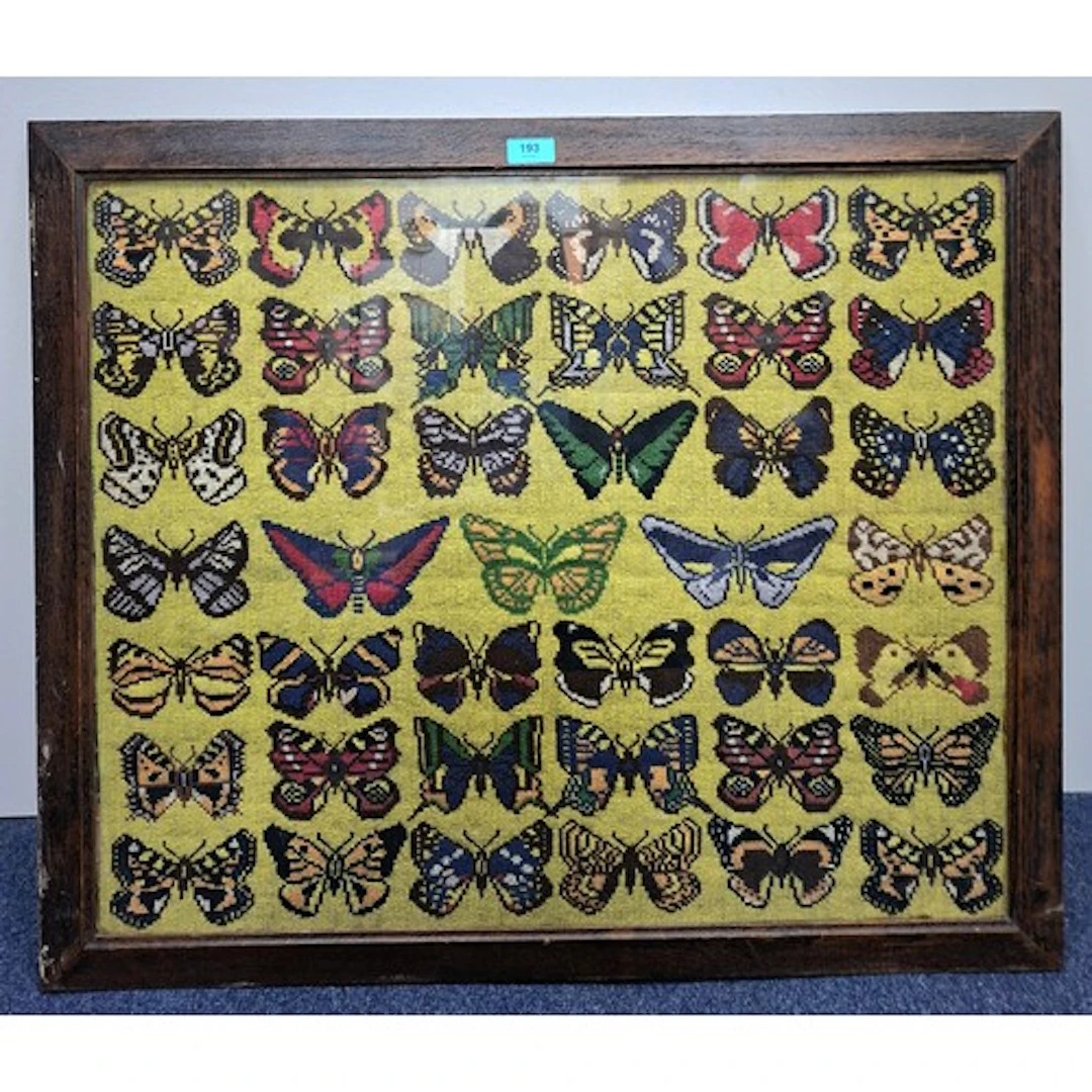 A vintage oak framed wool-work depicting 41 butterflies, app...