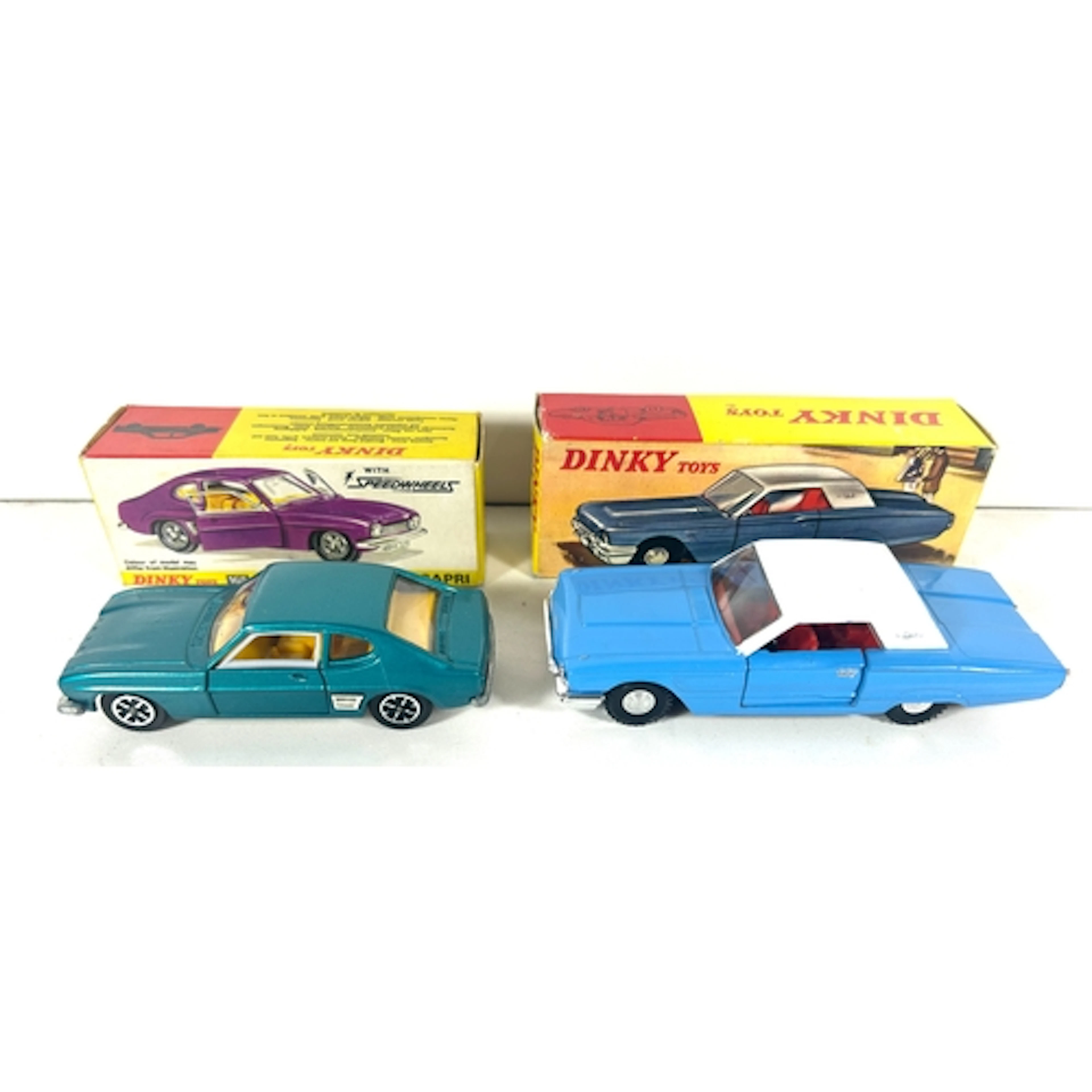 2 Dinky Toys. Ford Thunderbird (57/005) in mid blue with whi...