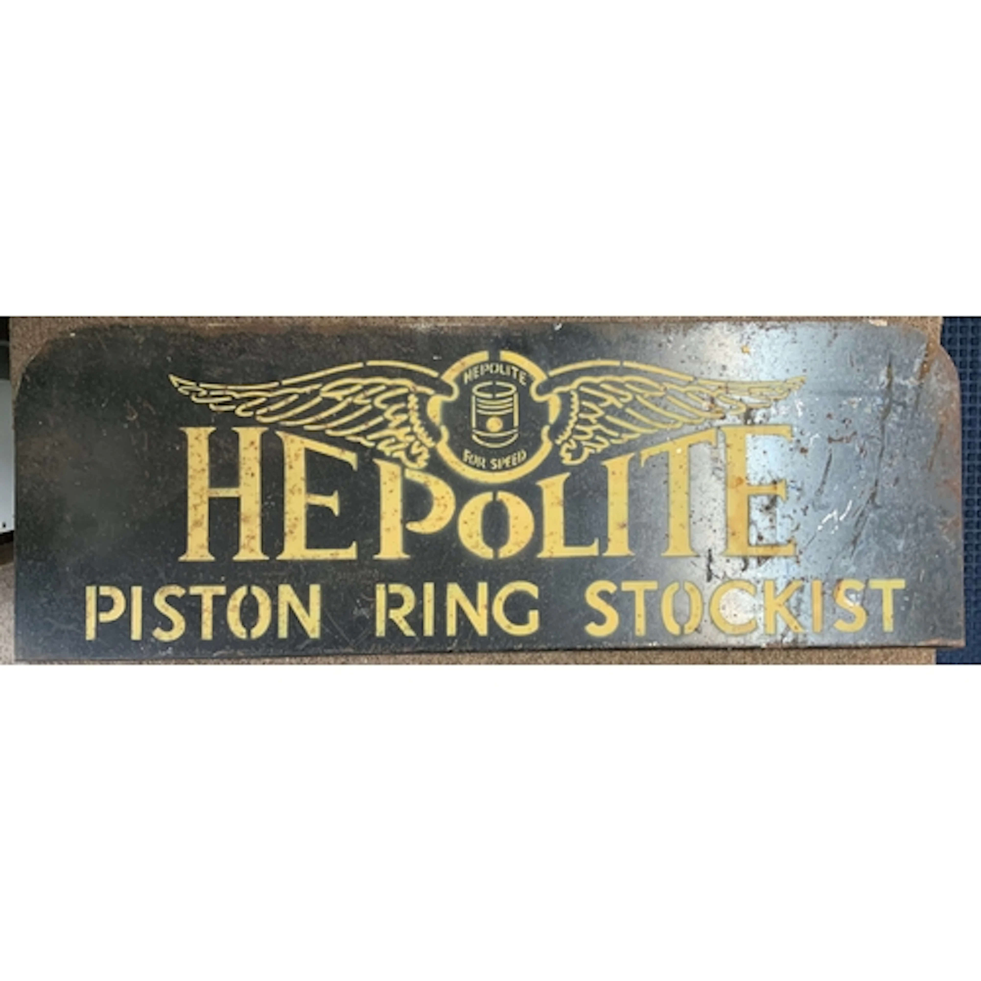 A Viintage painted advertising sign for Hepolite piston ring...