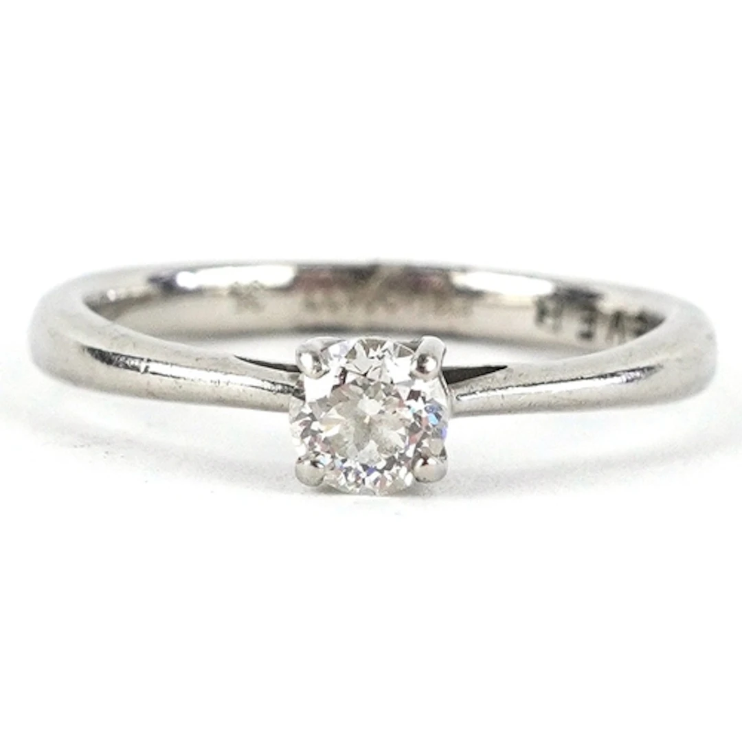 A palladium diamond solitaire ring, the diamond approximatel...