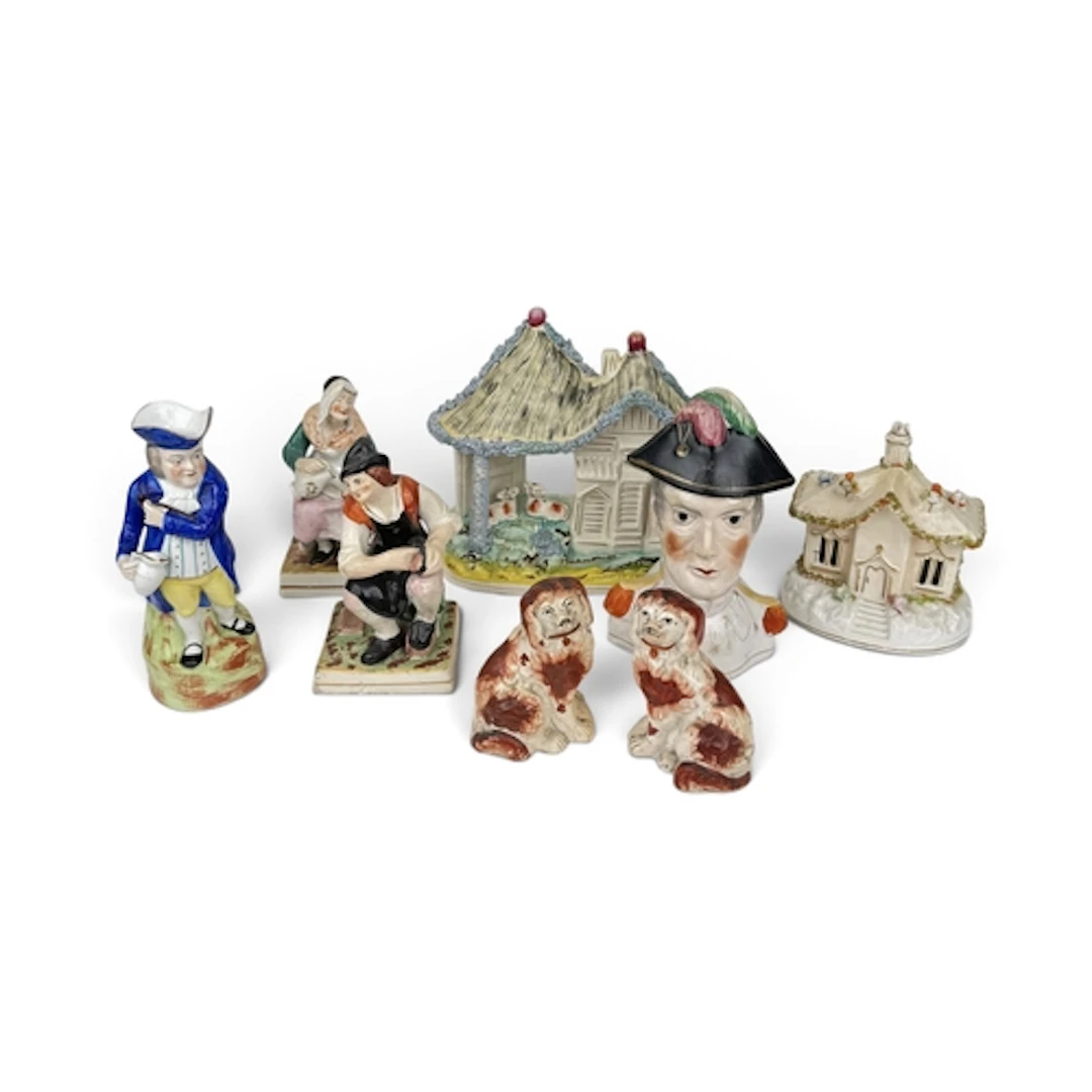 A STAFFORDSHIRE POTTERY JAR AND COVER IN THE FORM OF THE DUK...